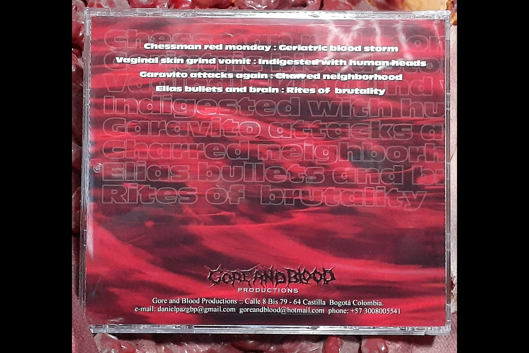 AMPUTATED GENITALS - Human Meat Gluttony CD BACK.jpg