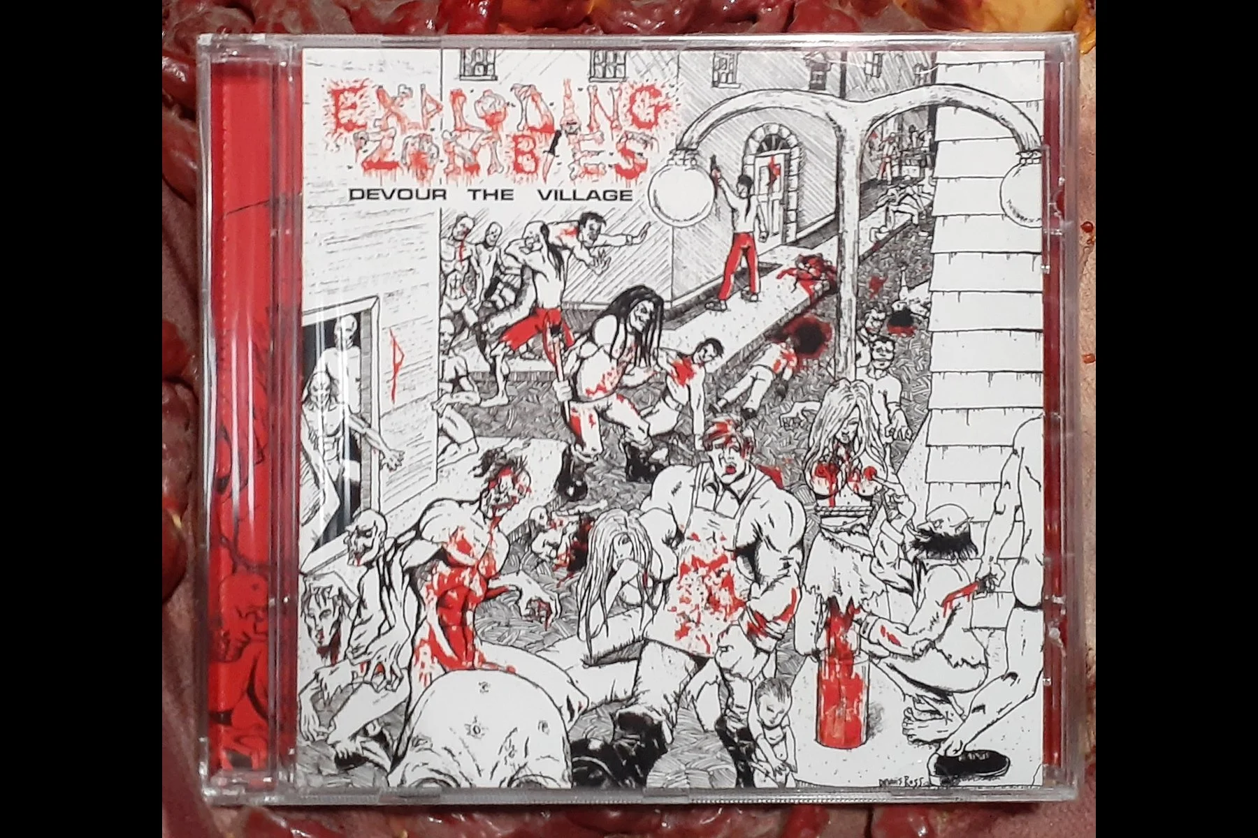 EXPLODING ZOMBIES - Devour The Village CD