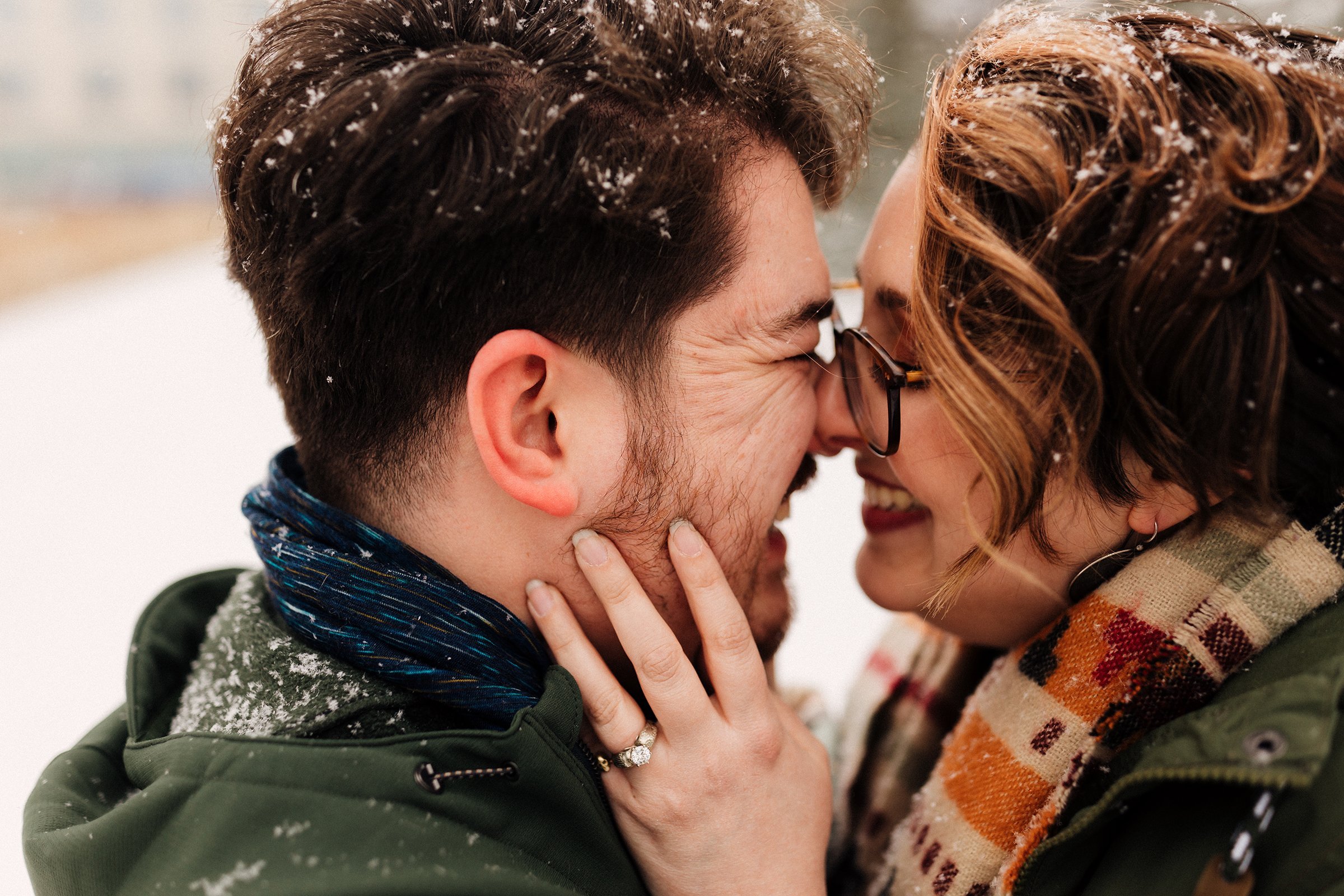 Davalyn_jeff_Engagment_Session_Downtown_Des_moines_Iowa_Couples_Photographer_Urban_Snow_Day_Winter_KMP_Photography-2498.jpeg