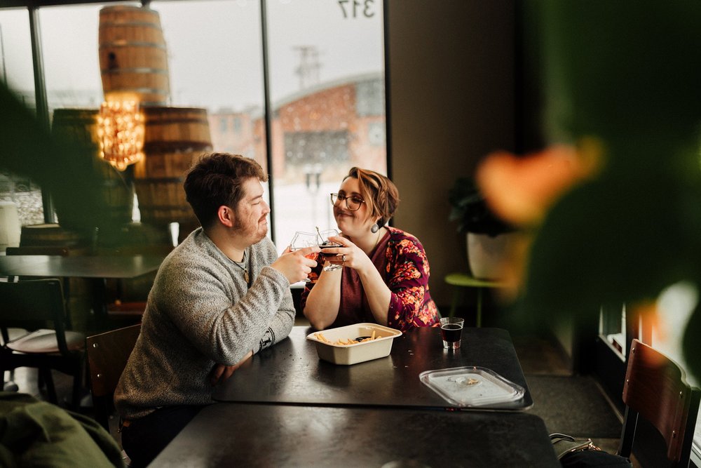 Davalyn_jeff_Engagment_Session_Downtown_Des_moines_Iowa_Couples_Photographer_Urban_Snow_Day_Winter_KMP_Photography-3707.jpeg