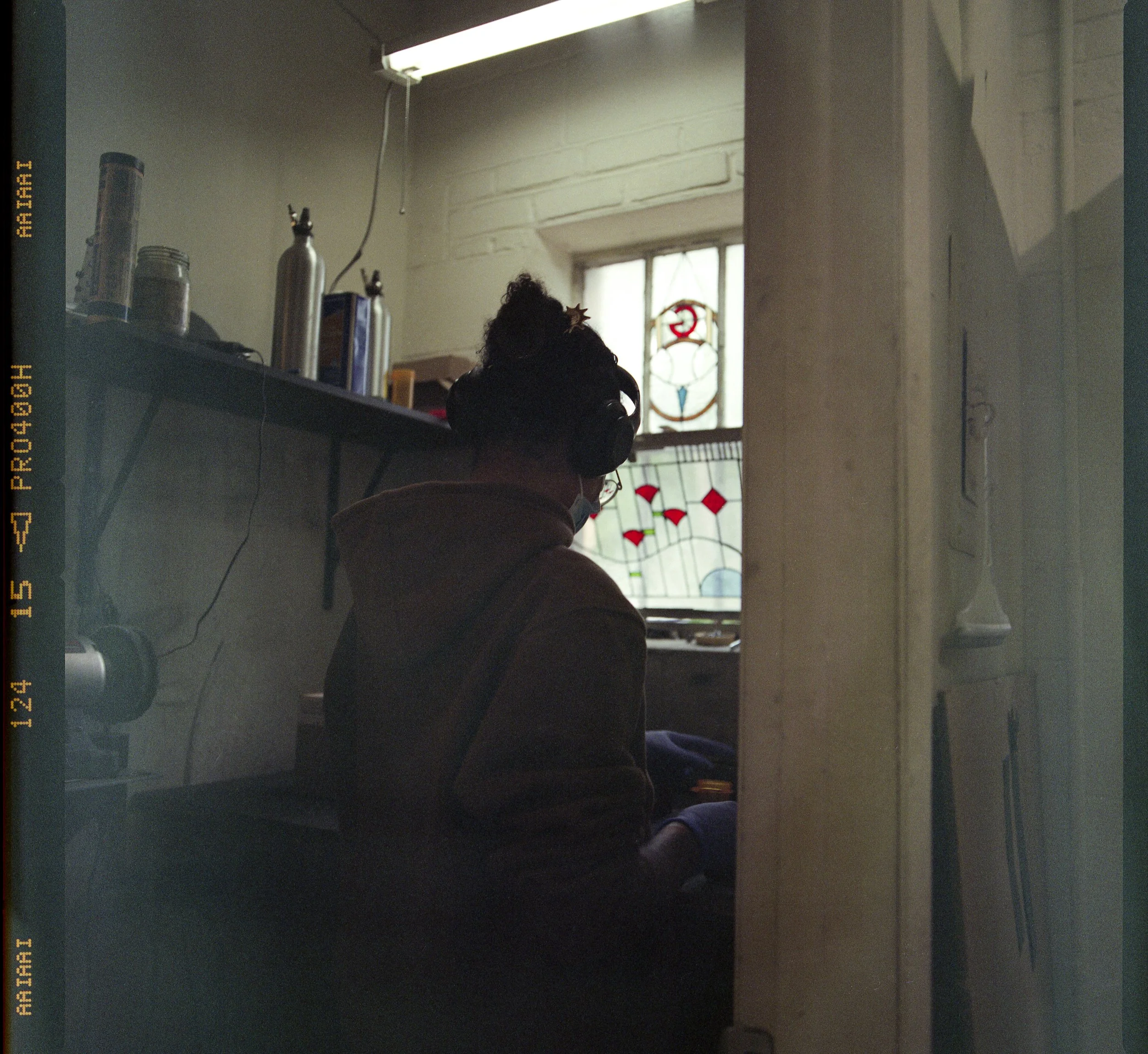 Typewriter Tech Ari Mills in the back room working on refurbishing some typewriters part by part