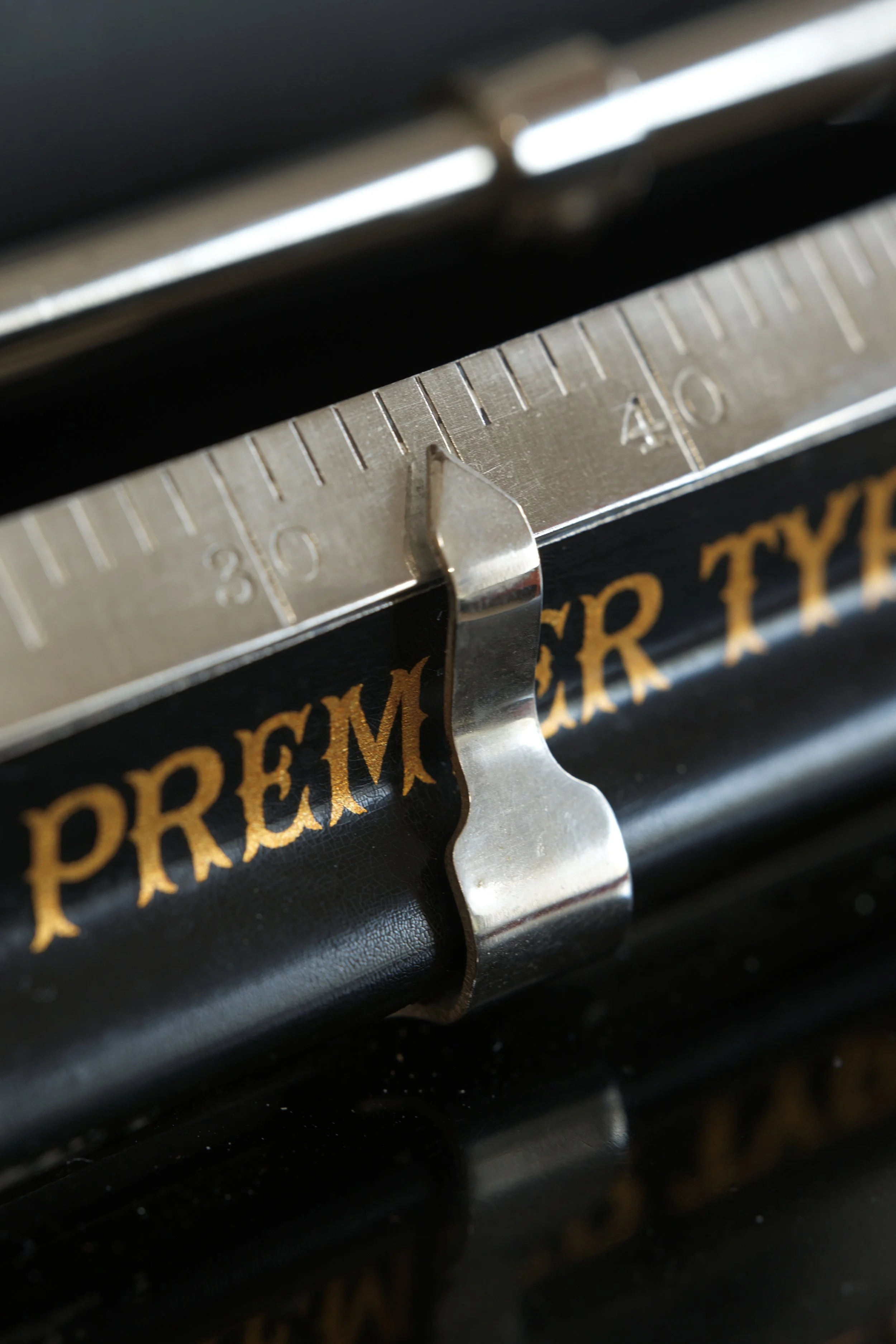 Closeup of the character indicator on a smith premier typewriter from 1890