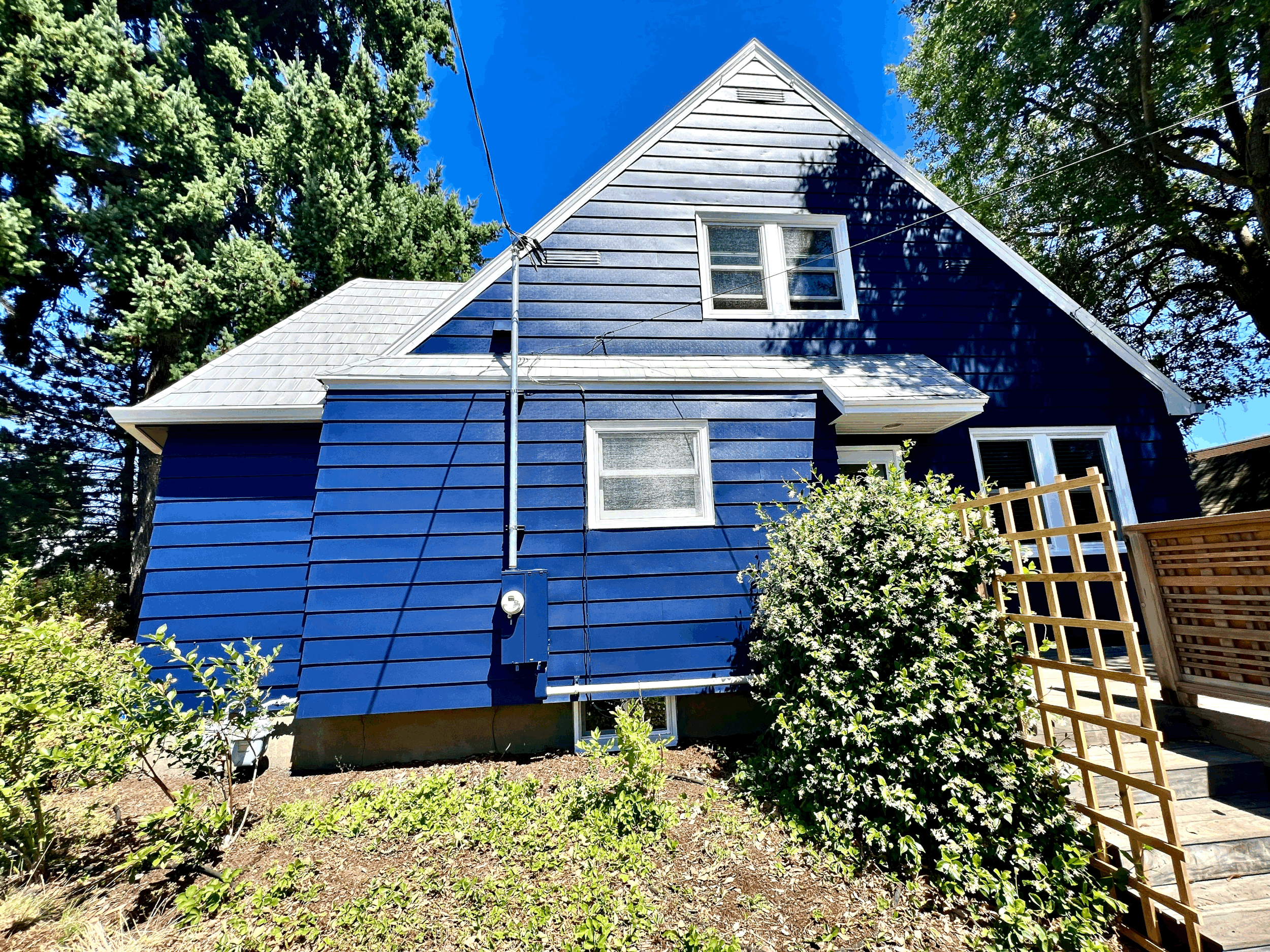 The Dark Side of Elegance: Understanding the Effects of Dark Colors on Your Home's Exterior Paint Longevity