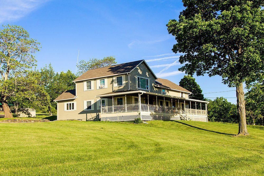 The historic Farmhouse at Grist Iron with a wrap-around porch