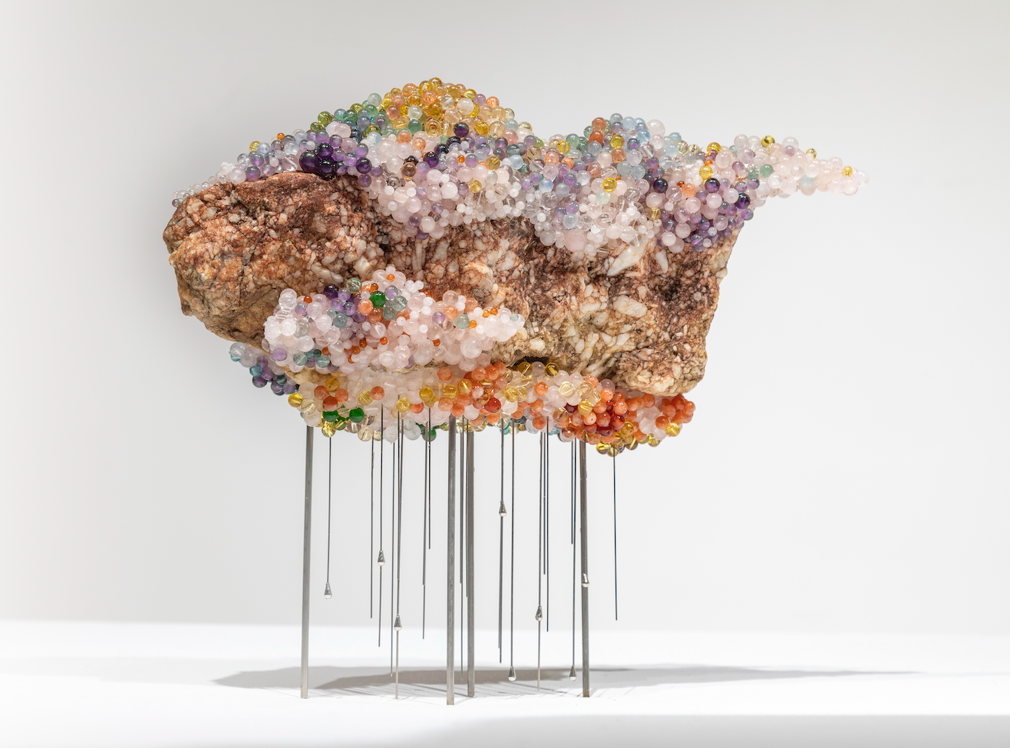 Out of the horizon (Thoát khỏi tầng không), 2026, quartz, crystal, steel on stone, 30 x 10 x 25 cm