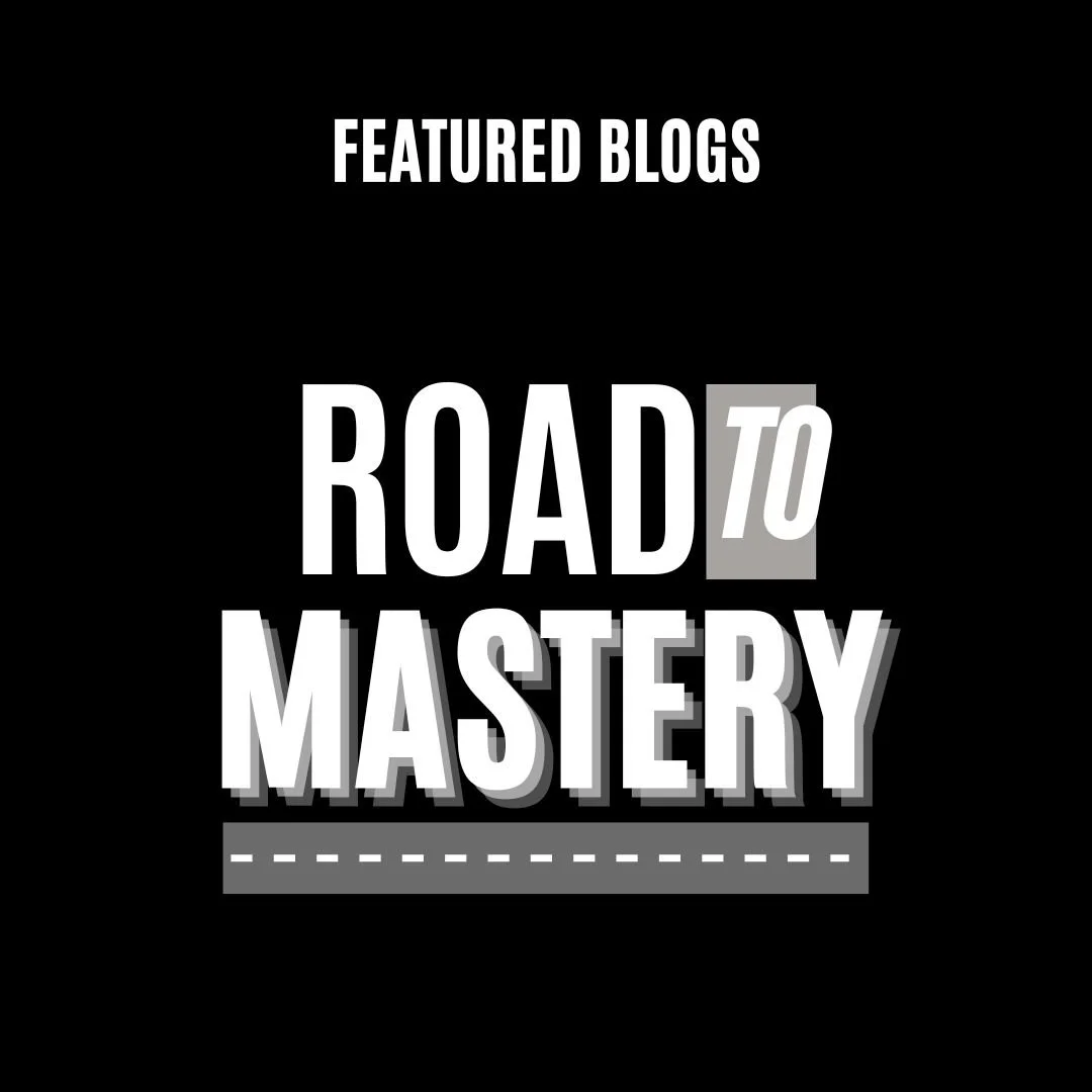 Black background with white and gray text reading 'Featured Blogs Road to Mastery' over an illustration of a road.