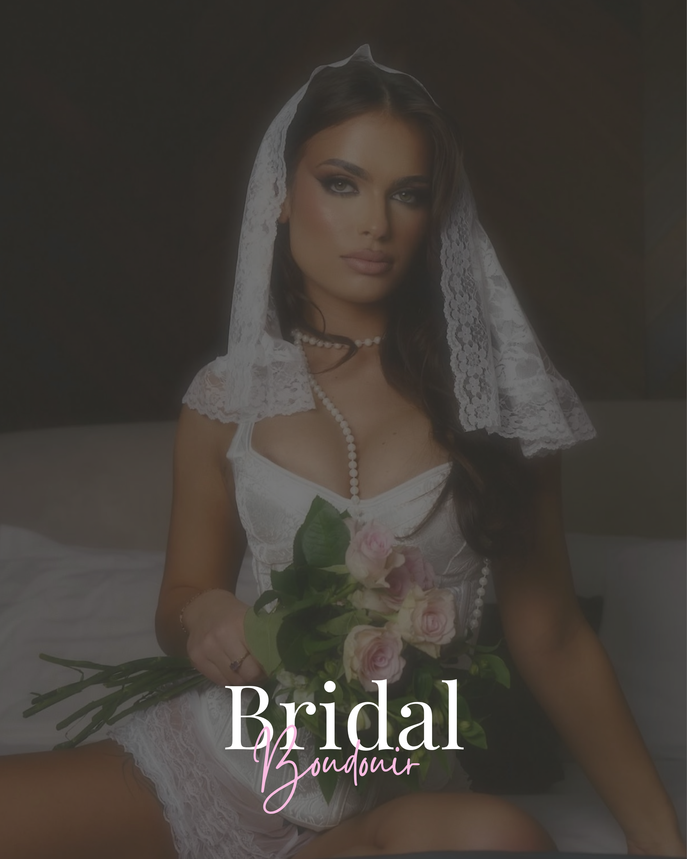 A woman dressed in bridal attire with a lace veil, holding a bouquet of pink roses, sitting on a bed with a dark background.