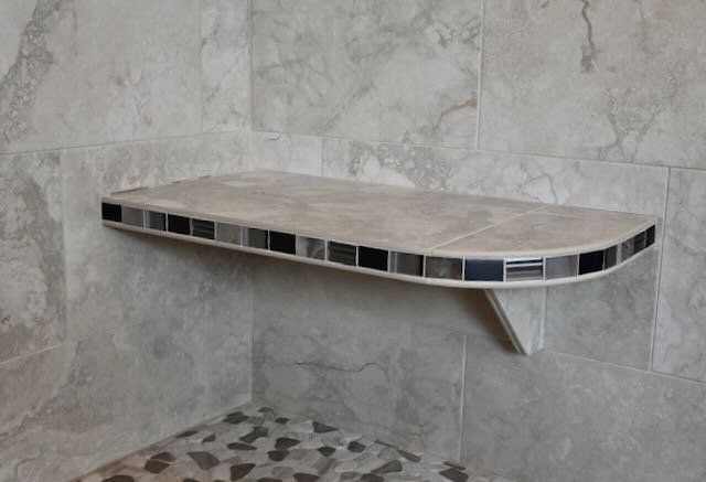 Curved floating bench with hand bullnose edges