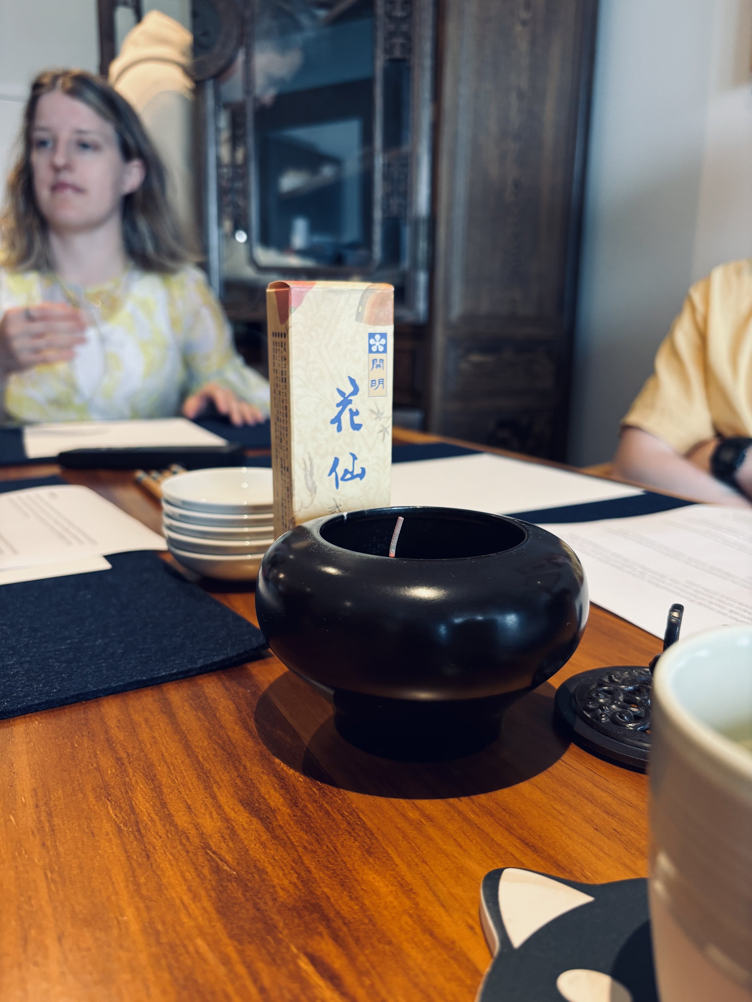 An incense holder displayed on a table