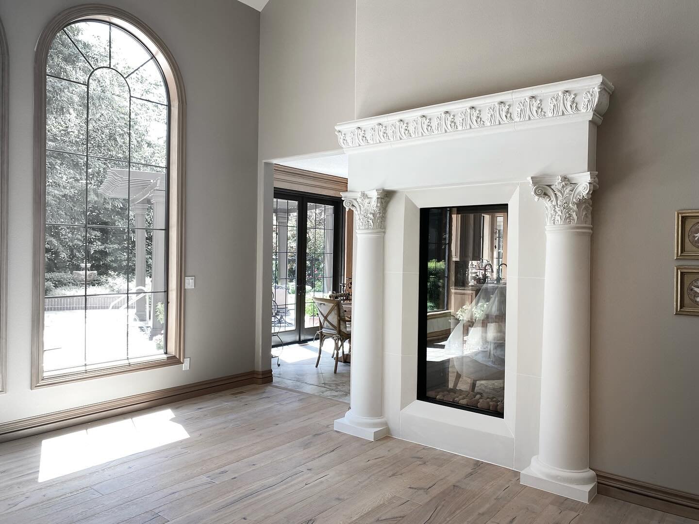 Custom elevated Fireplace surround.
. 
.
.
#artbyarafireplace #fireplace  #fireplacesurround #fireplacedesign  #caststone #fireplaceideas #stonesurround #stonemantel #limestonefireplace #luxuryfireplace #customfireplace #customsurround #modernfirepla