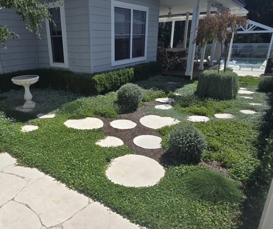 Throwback to these beautiful stone steppers at our project in The Oaks!⁠
⁠
Steppers like these are a great way to add visual interest to your outdoor space in a way that brings all the other elements together! The final result is a backyard space tha
