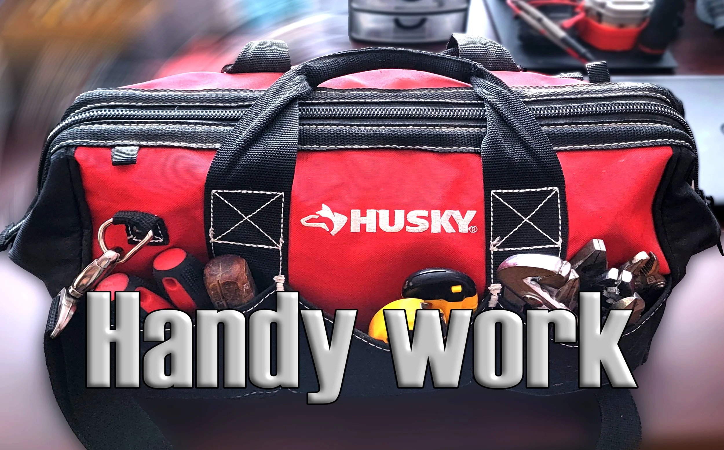 Red and black Husky tool bag with various tools and items inside, and the words "Handy work" overlaid.