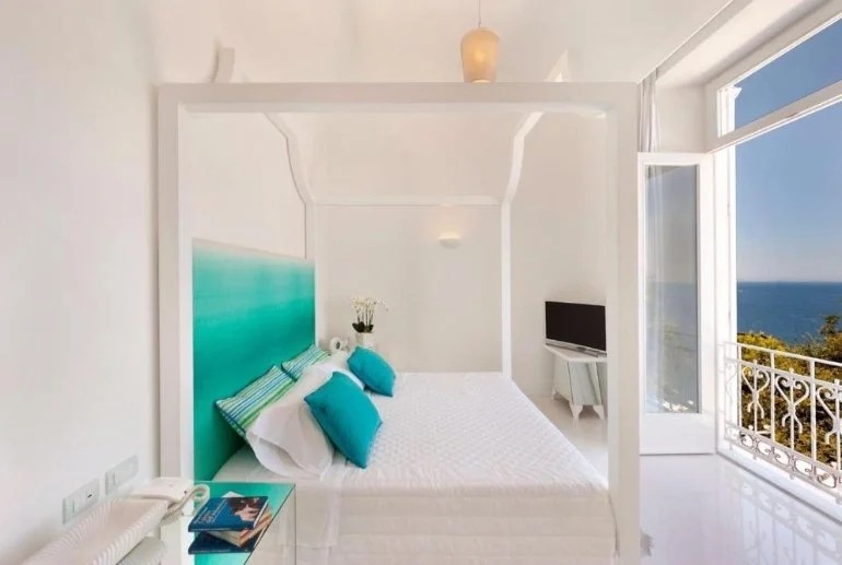 Villa Silvana blue suite king bed plus sofa bed.jpeg