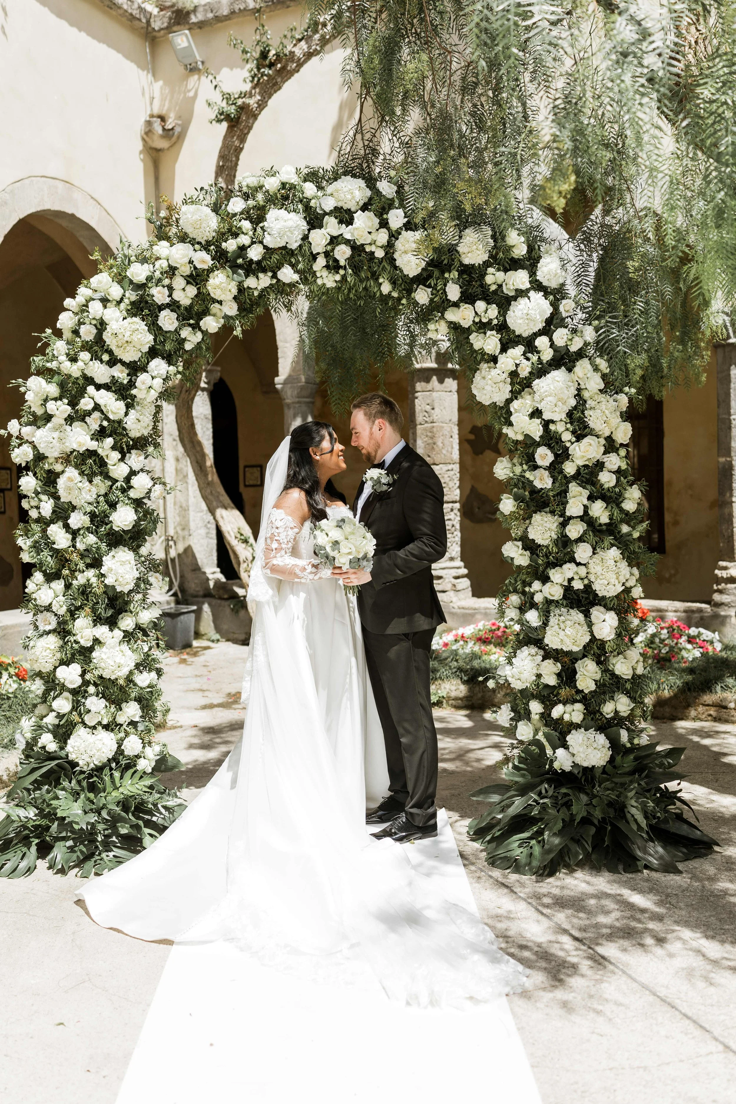 The Cloisters flower arch ceremony.jpg