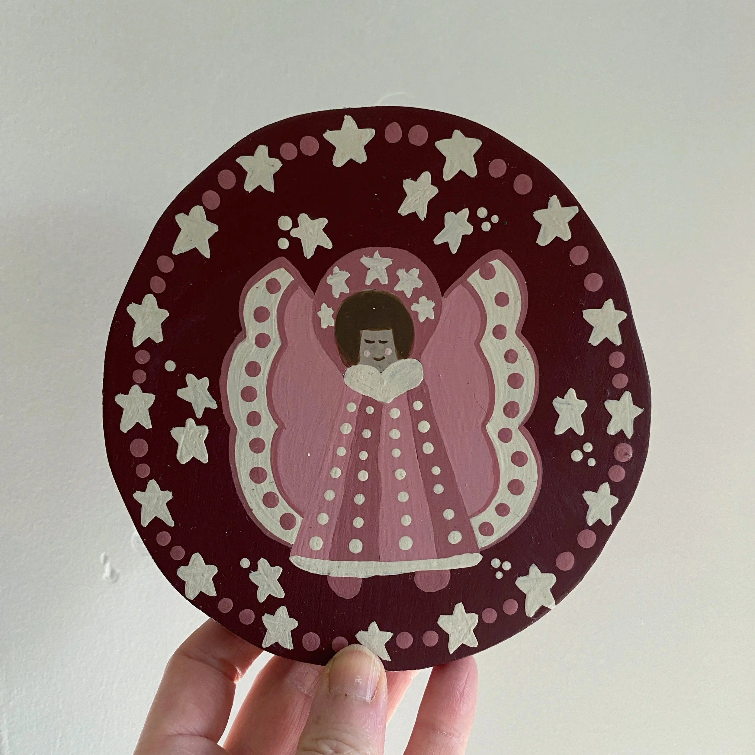 red folk art floral decorative round