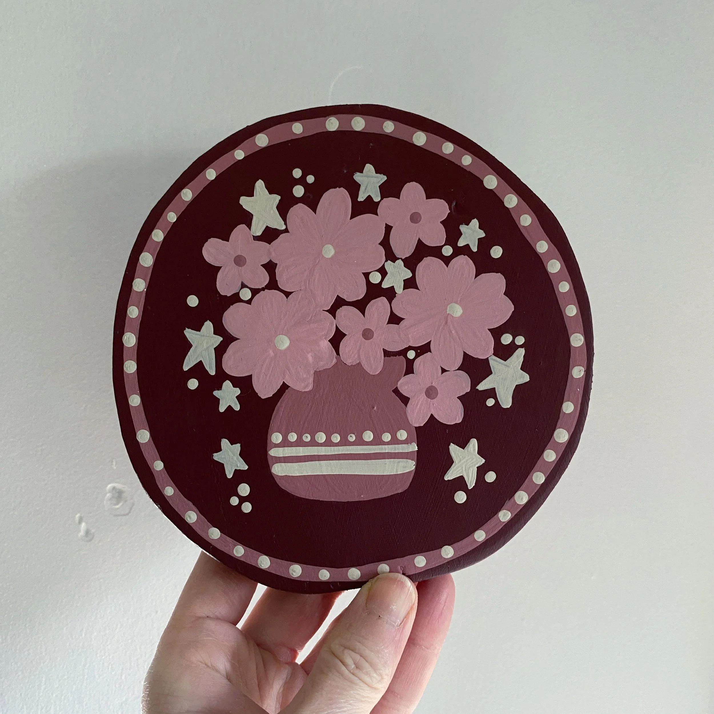 red folk art floral decorative round