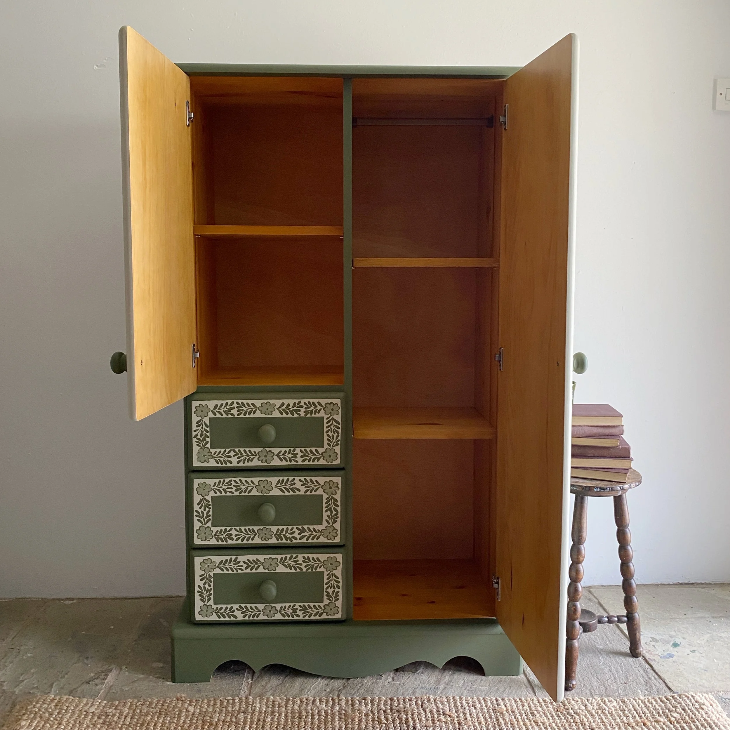 Green folk art wardrobe