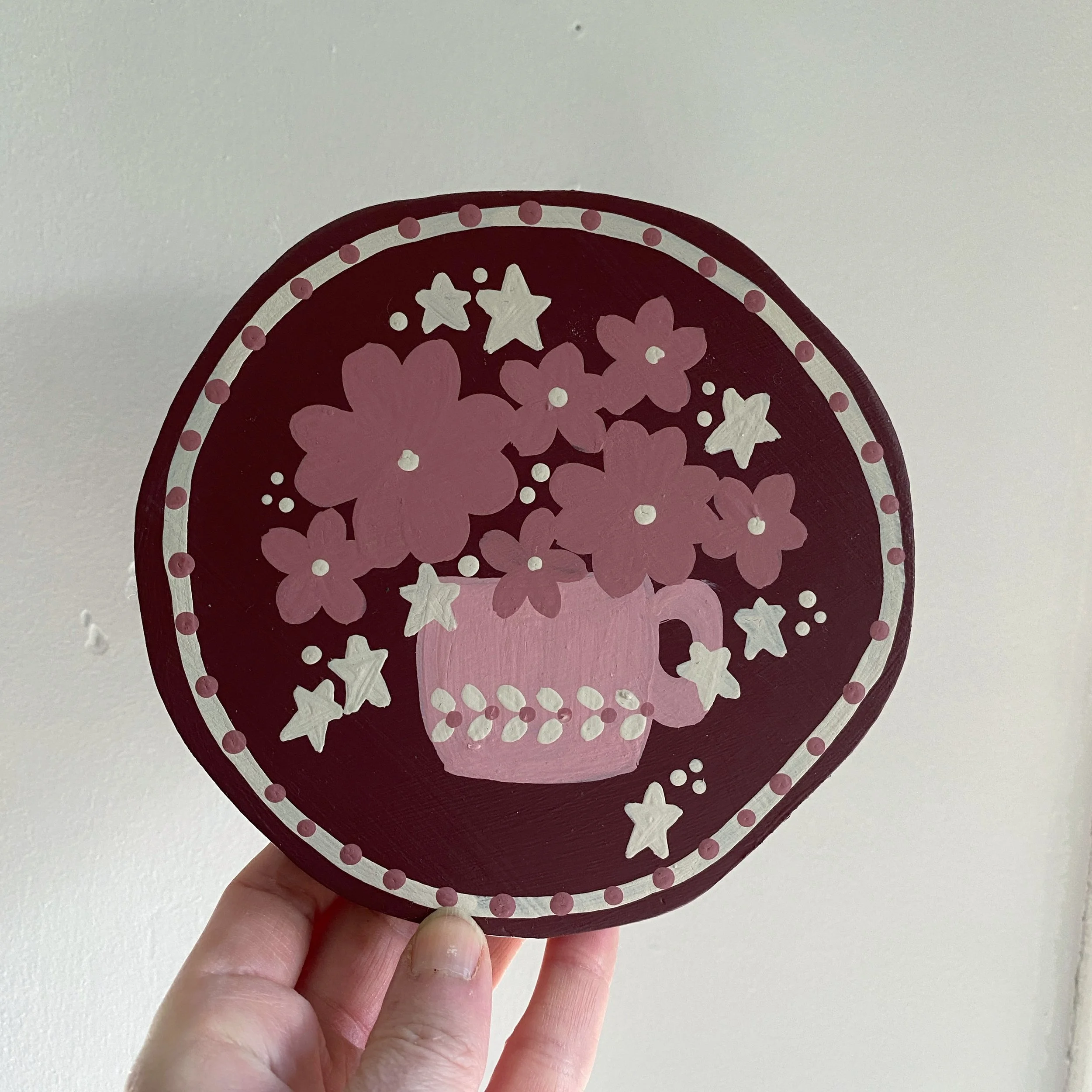 red folk art floral decorative round