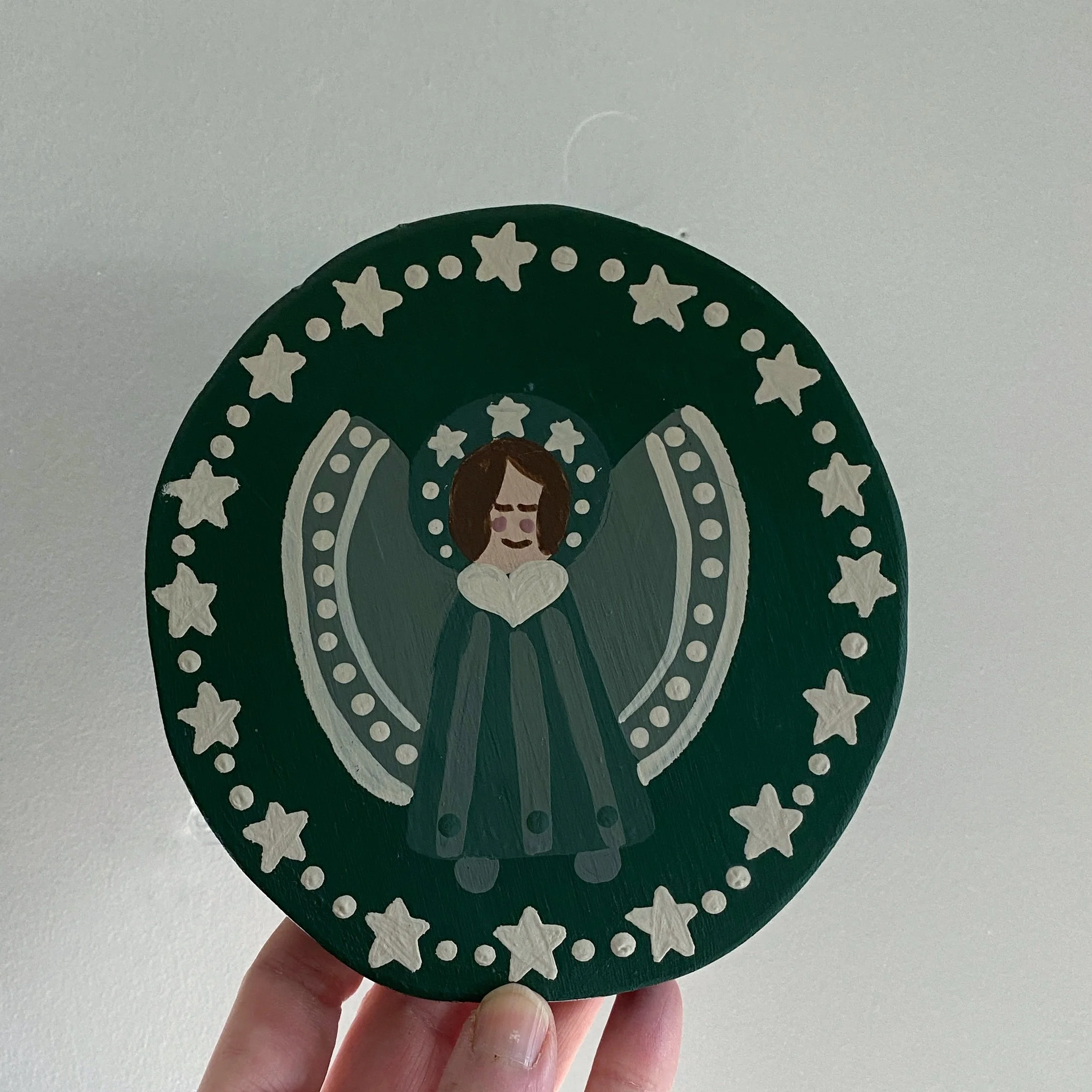 green folk art decorative round
