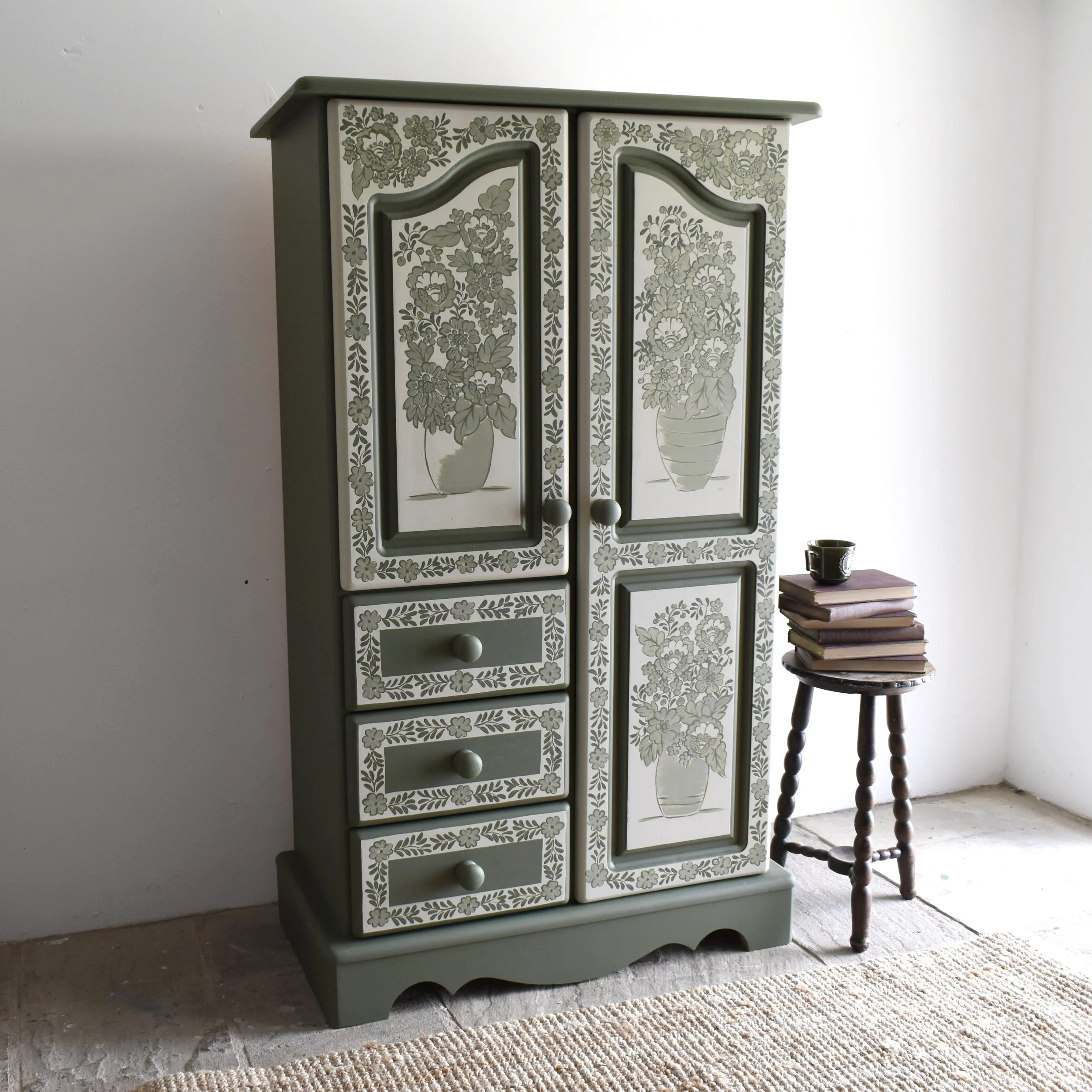 Green folk art wardrobe