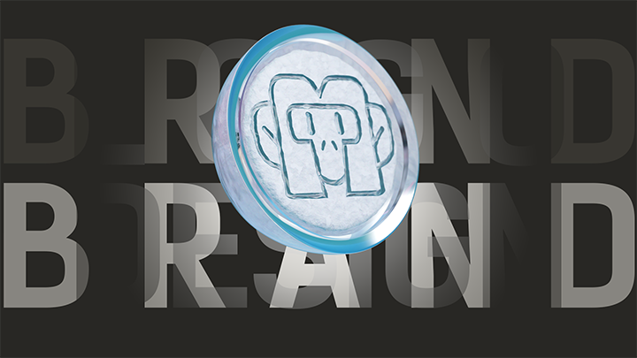 A round blue resin keychain with a raised design of a stylized face with glasses and a baseball cap, placed in front of a black background with the word "BEYOND" repeated in large gray letters.