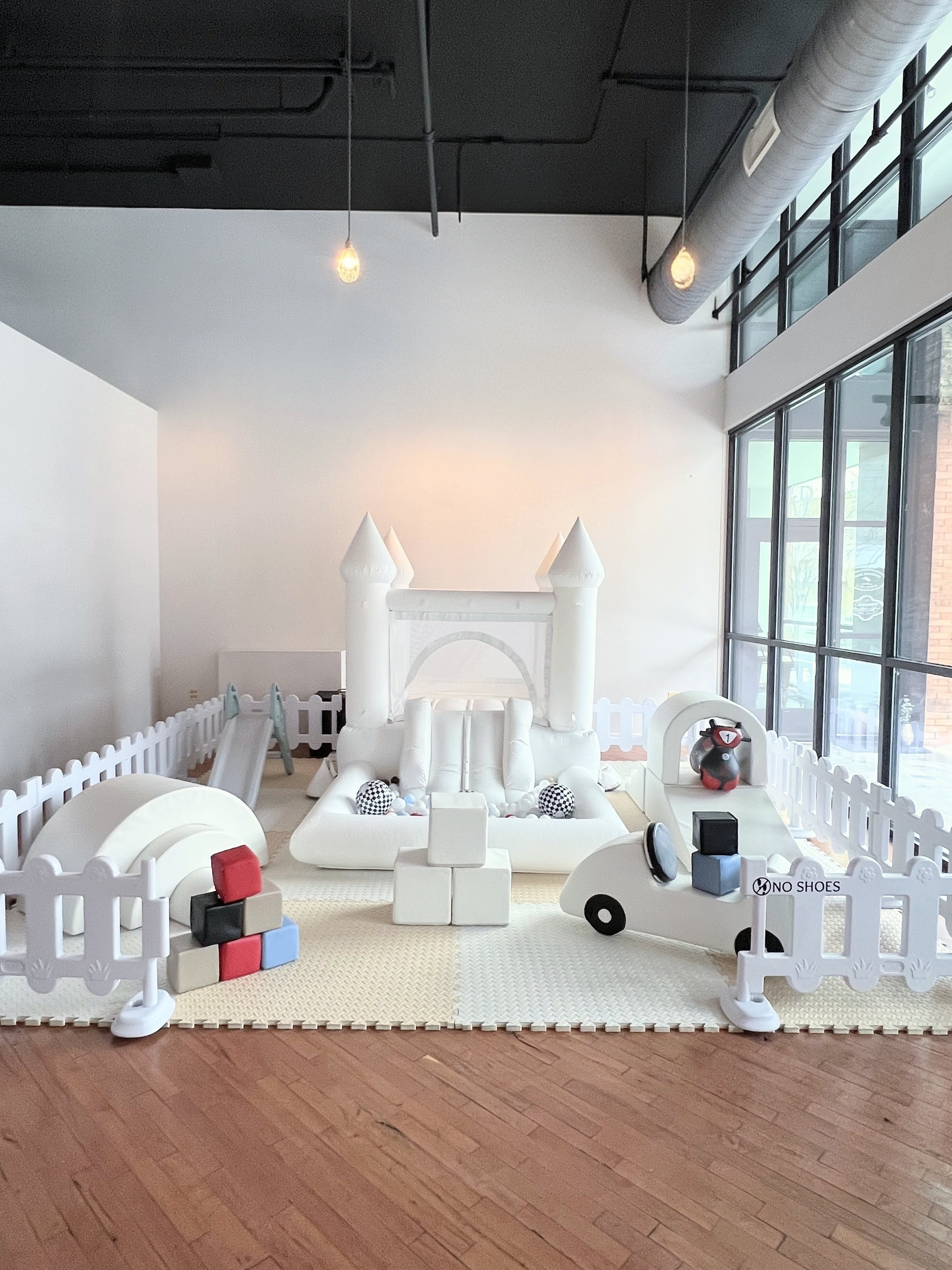 Midi Bounce House Set- 12'x12' Play Area (approx 4 additional feet needed to accommodate the bounce house blower tube behindd the play area), Midi Bounce House Set $525-- Ball Pit Bounce House, Slide, Rainbow, Arch Step and Slide, Jumbo Blocks, Anima