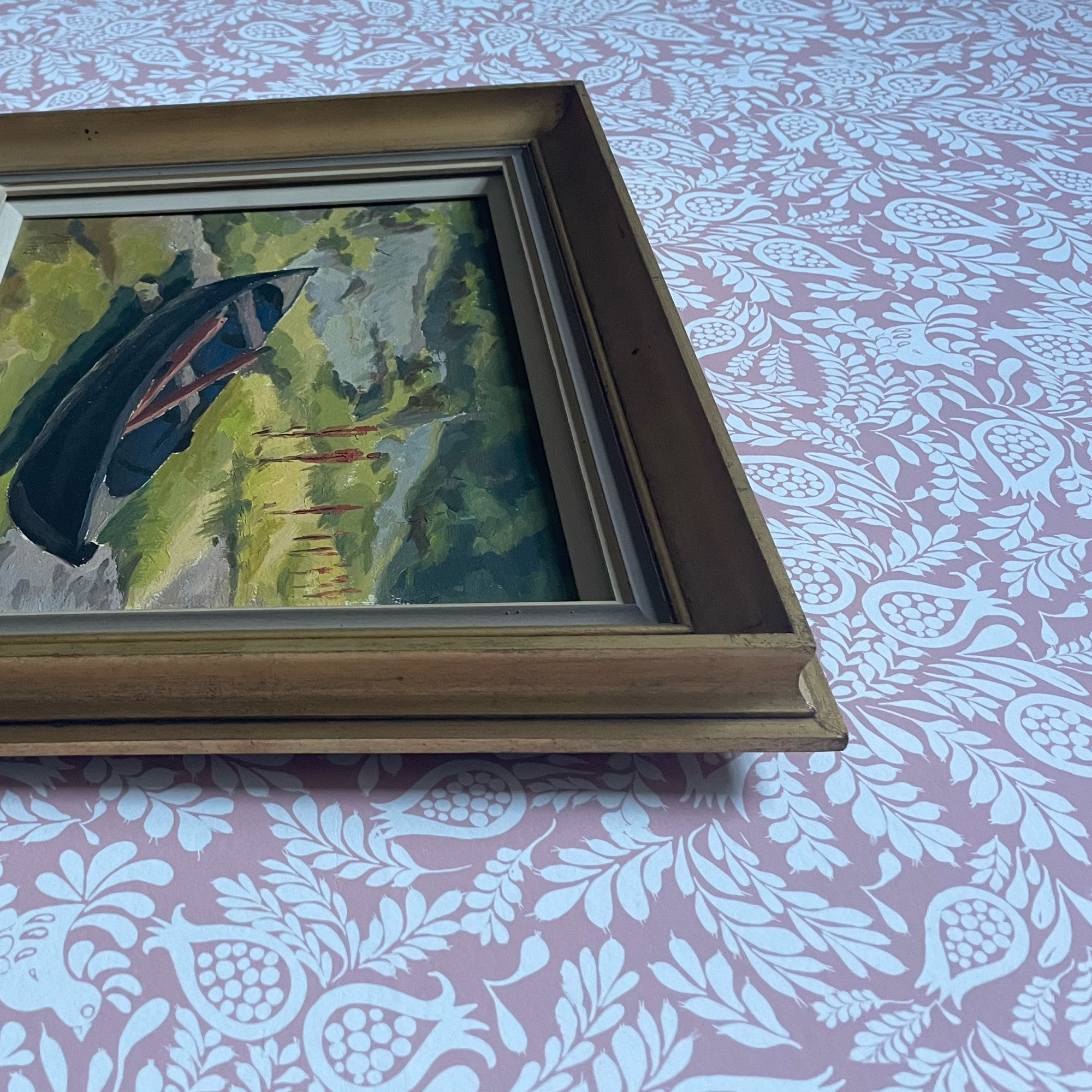 close up of little boat painting frame.jpeg
