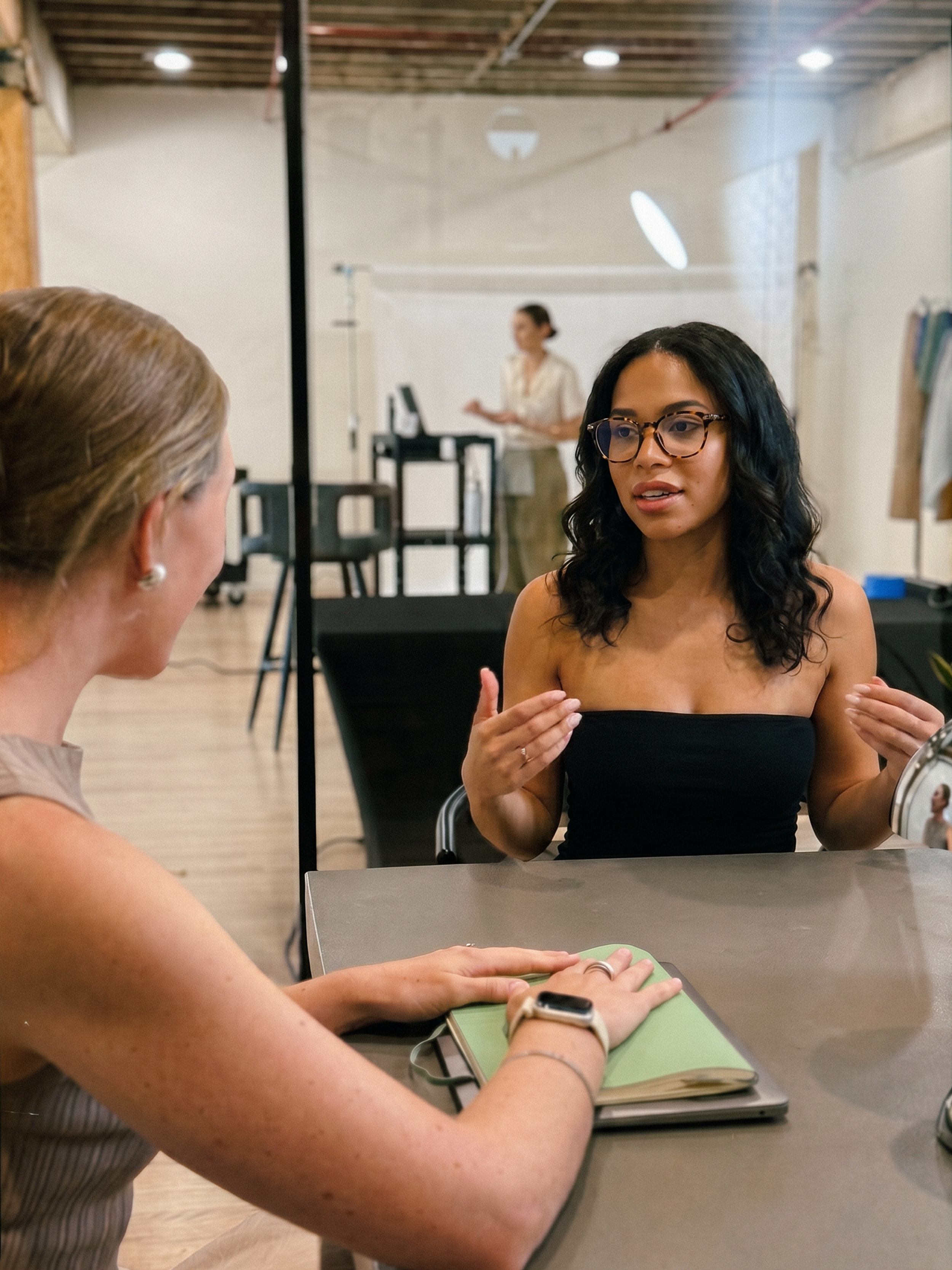 fashion incubator marketing team meeting with an entrepreneur