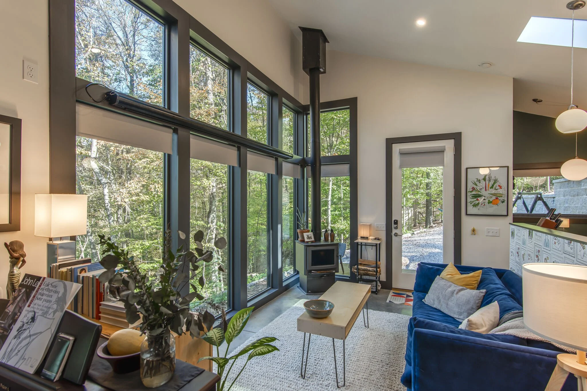 Living space of the modern tiny home named The Dog House, in Nashville, Tennessee, designed by Ryan Thewes, Architect