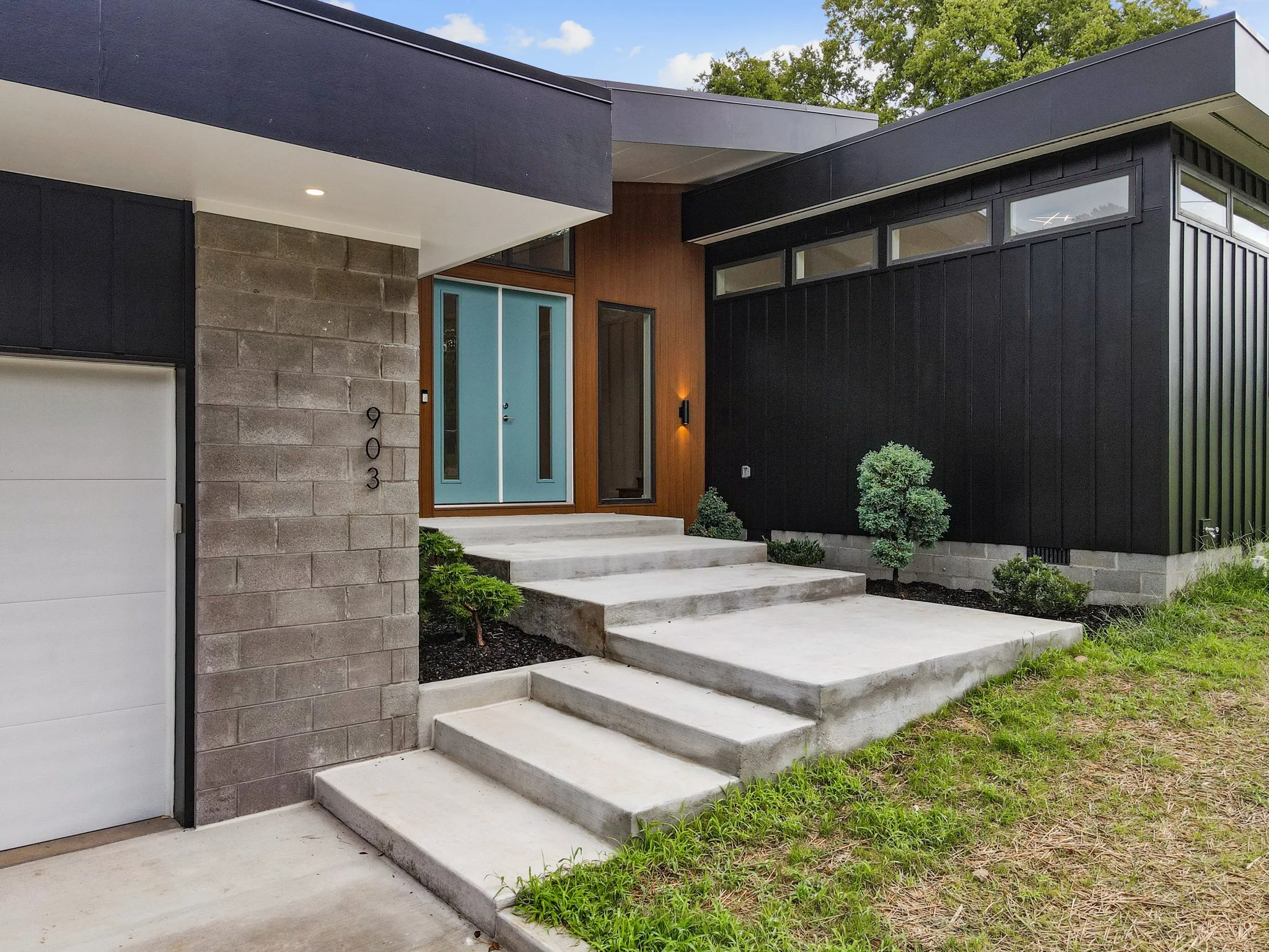 Front walk-up of Butterfly House, a mid century modern house in Nashville, Tennessee, designed by Ryan Thewes, Architect