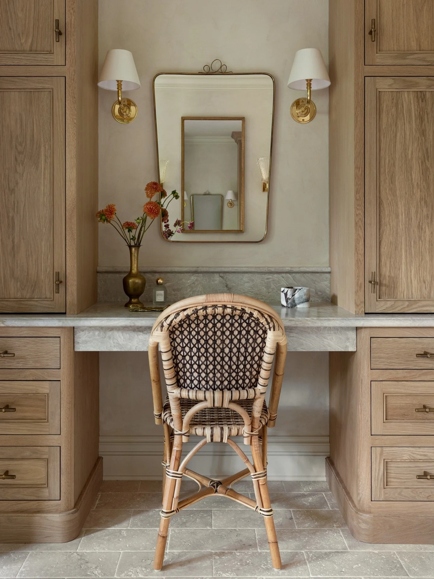 A favorite moment from our Chicago bathroom renovation. The vintage Italian mirror paired with a Parisian caf&eacute; chair creates a makeup vanity that feels soulful, layered, and timeless.

And a special shoutout to our contractor and millworker fo