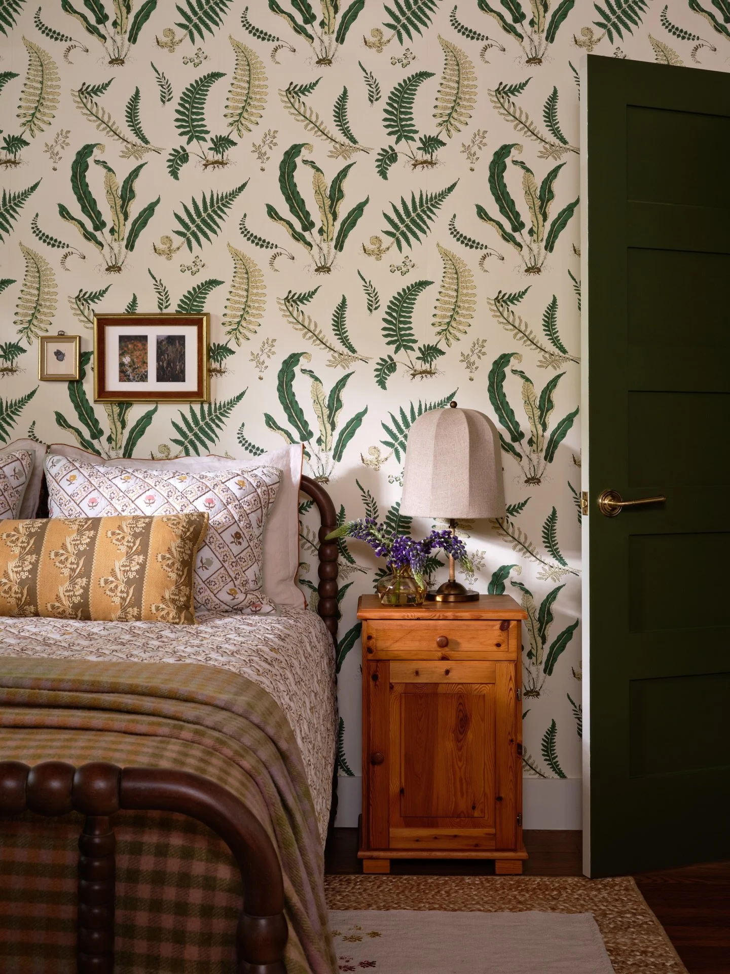 Spring always seems to arrive first in our guest bedroom. The morning light here is impossibly cheerful, so I leaned in&mdash;starting with the fern wallpaper to echo that fresh, garden-adjacent feeling the room naturally has.

From there, it became 