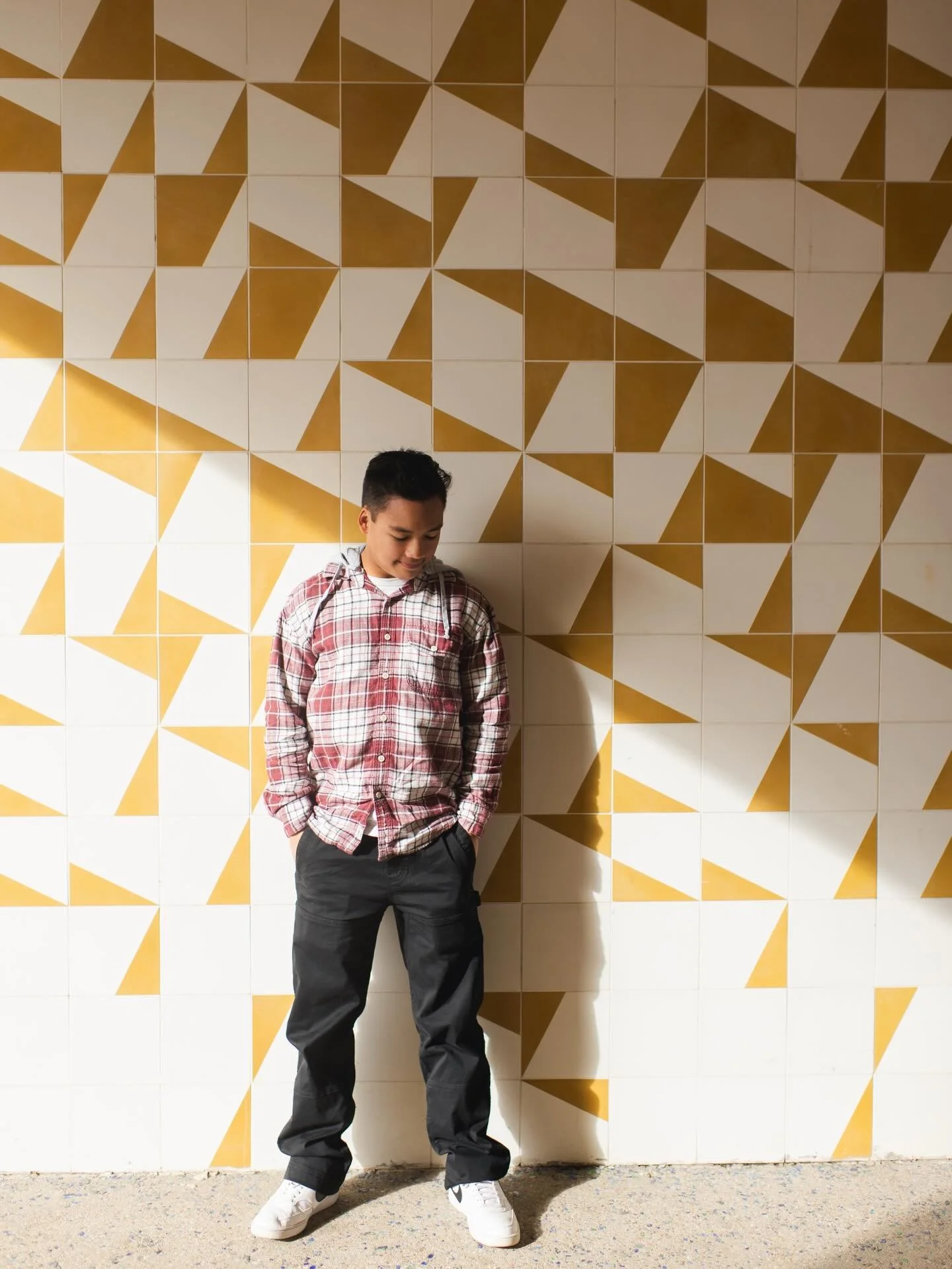 Max wanted an urban session for his senior portraits but didn&rsquo;t want the seriousness of downtown. Having vibrancy, chill vibes, and fun colors suited his personality so we shot in Bishop Arts. It just so happened to also be so so cold the morni