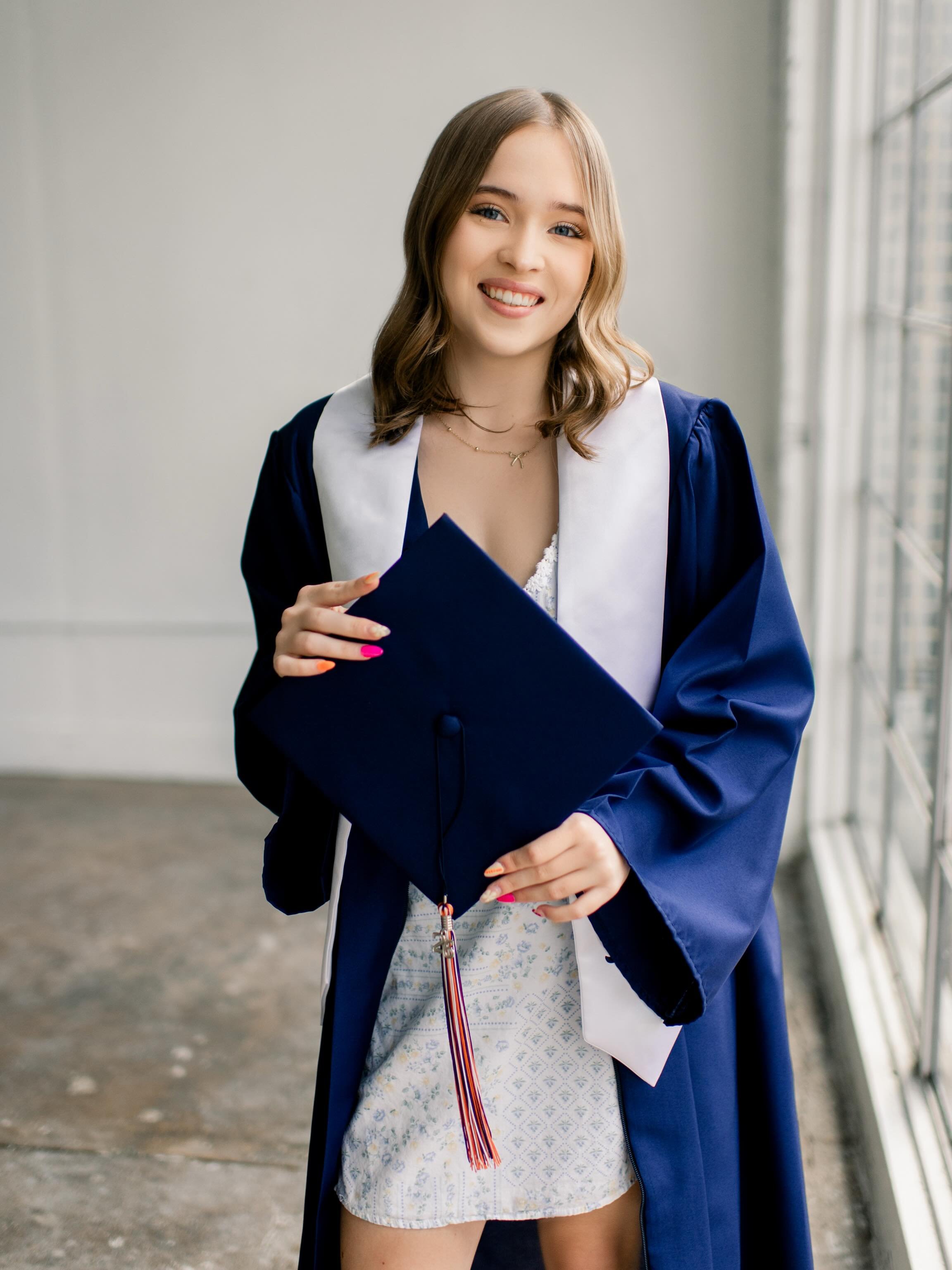 Congrats to Emily on graduating! We did her senior session in the fall but she came into our last mini day to update her cap and gown + college commitment photos! 🎓 &bull;&bull;&bull; we have a mini THIS Friday, May 8th and JUST ONE spot left - grea