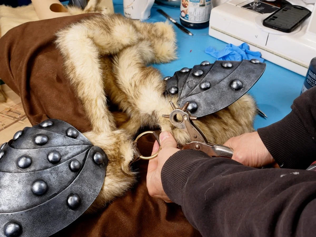 attaching the pauldrons to the hood