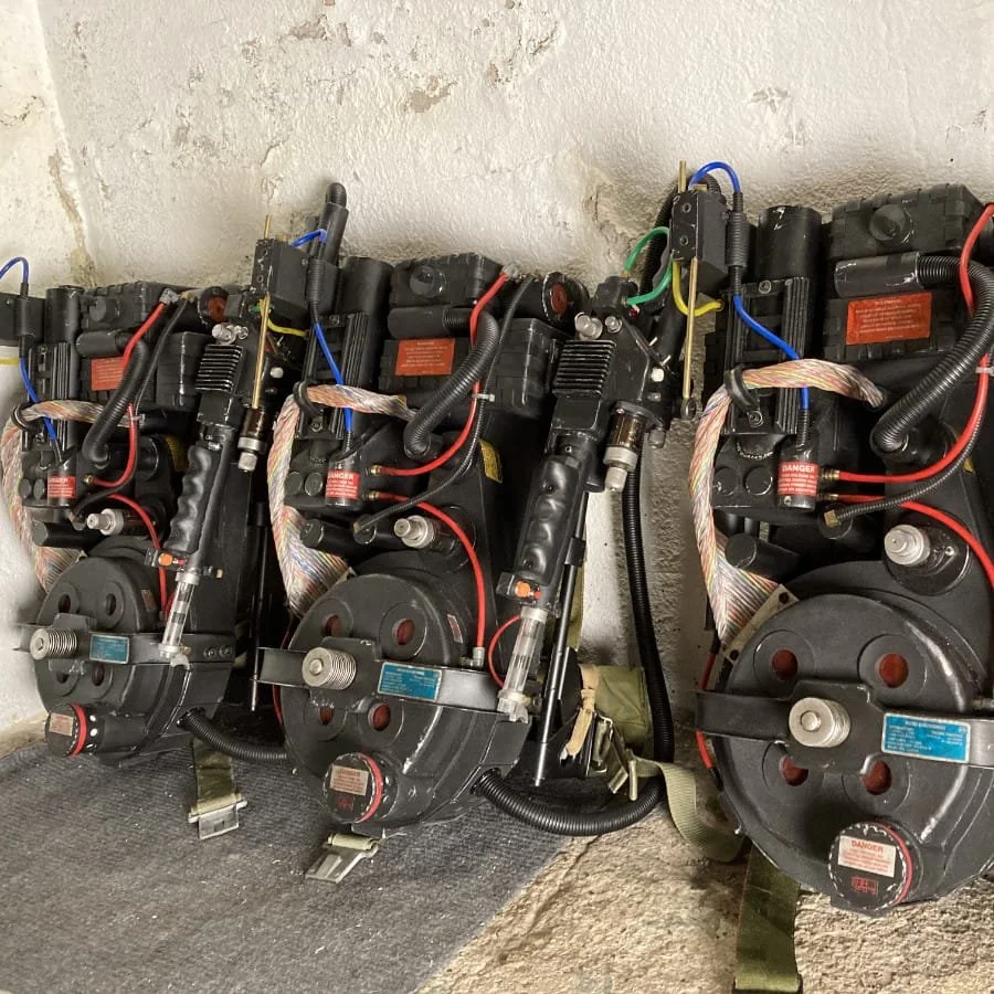three proton packs made by a customer