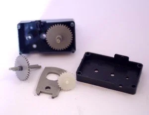 Parts of plastic mechanism taken apart