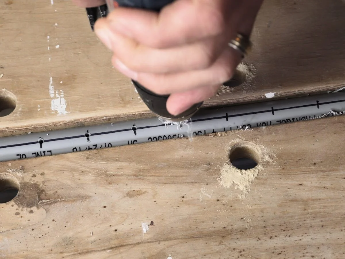 using a 3mm drill bit to make holes in pipe