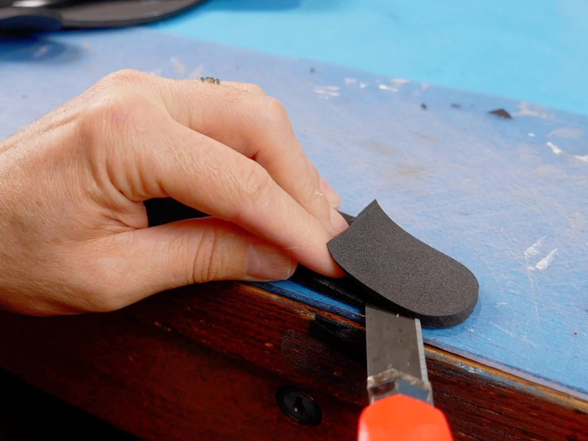 Using sharp knife to taper the foam on the bands