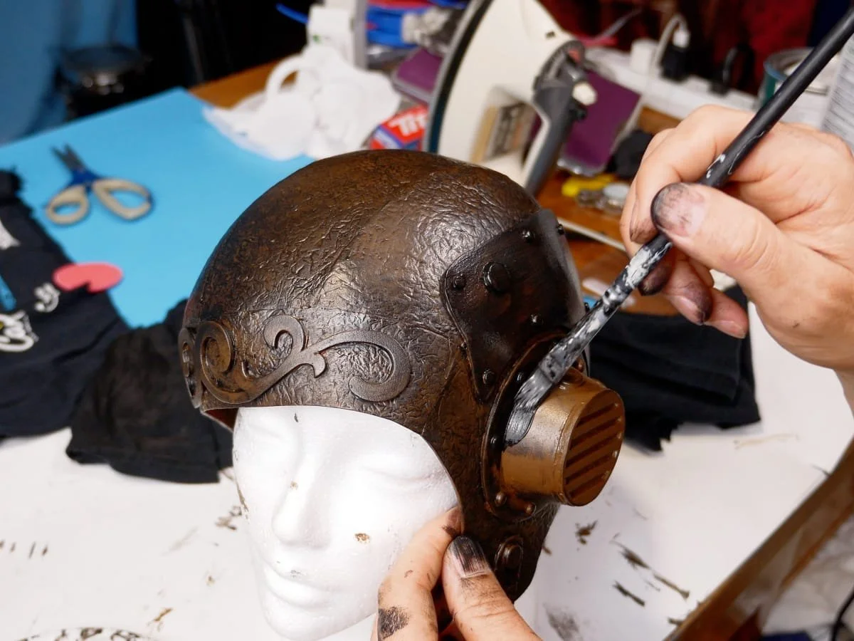 painting certain areas black that are going to look like brass