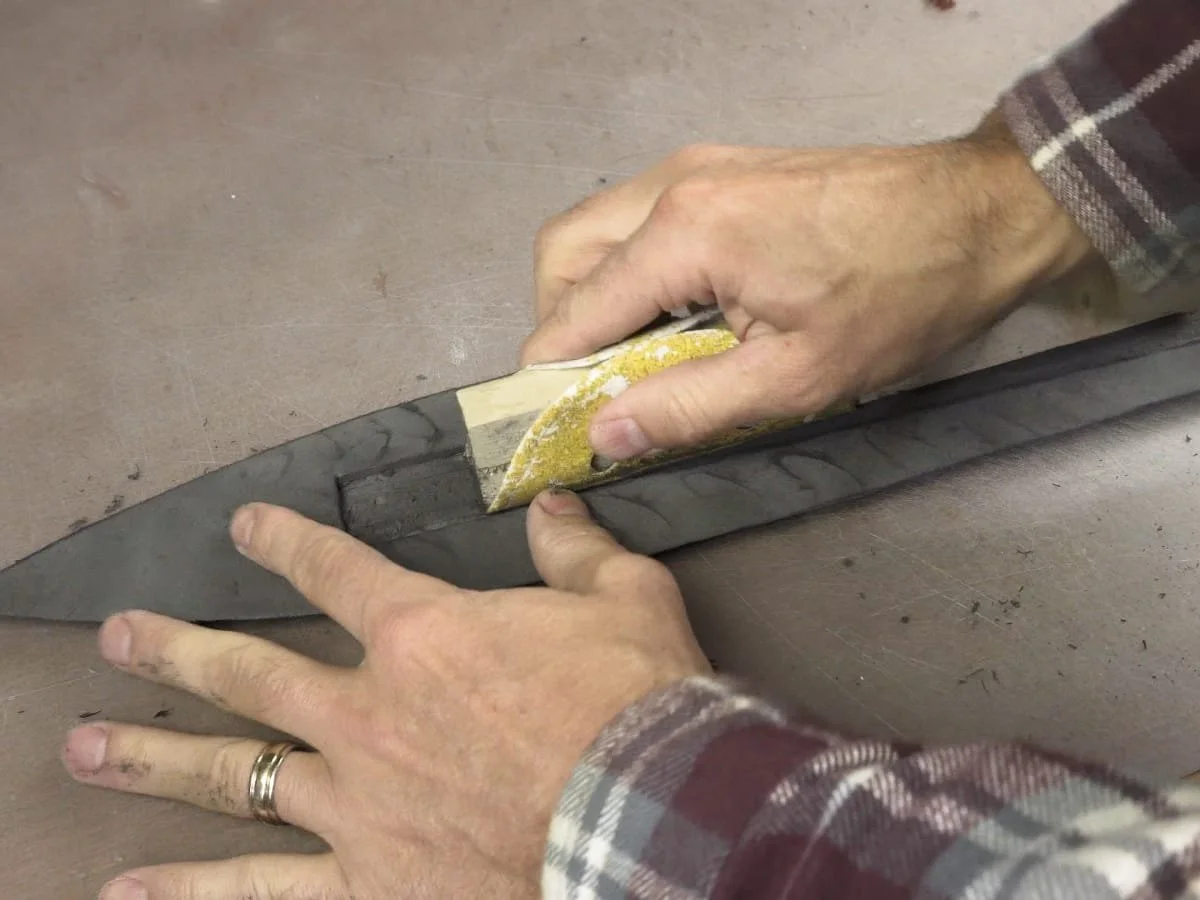 sanding the slot flat