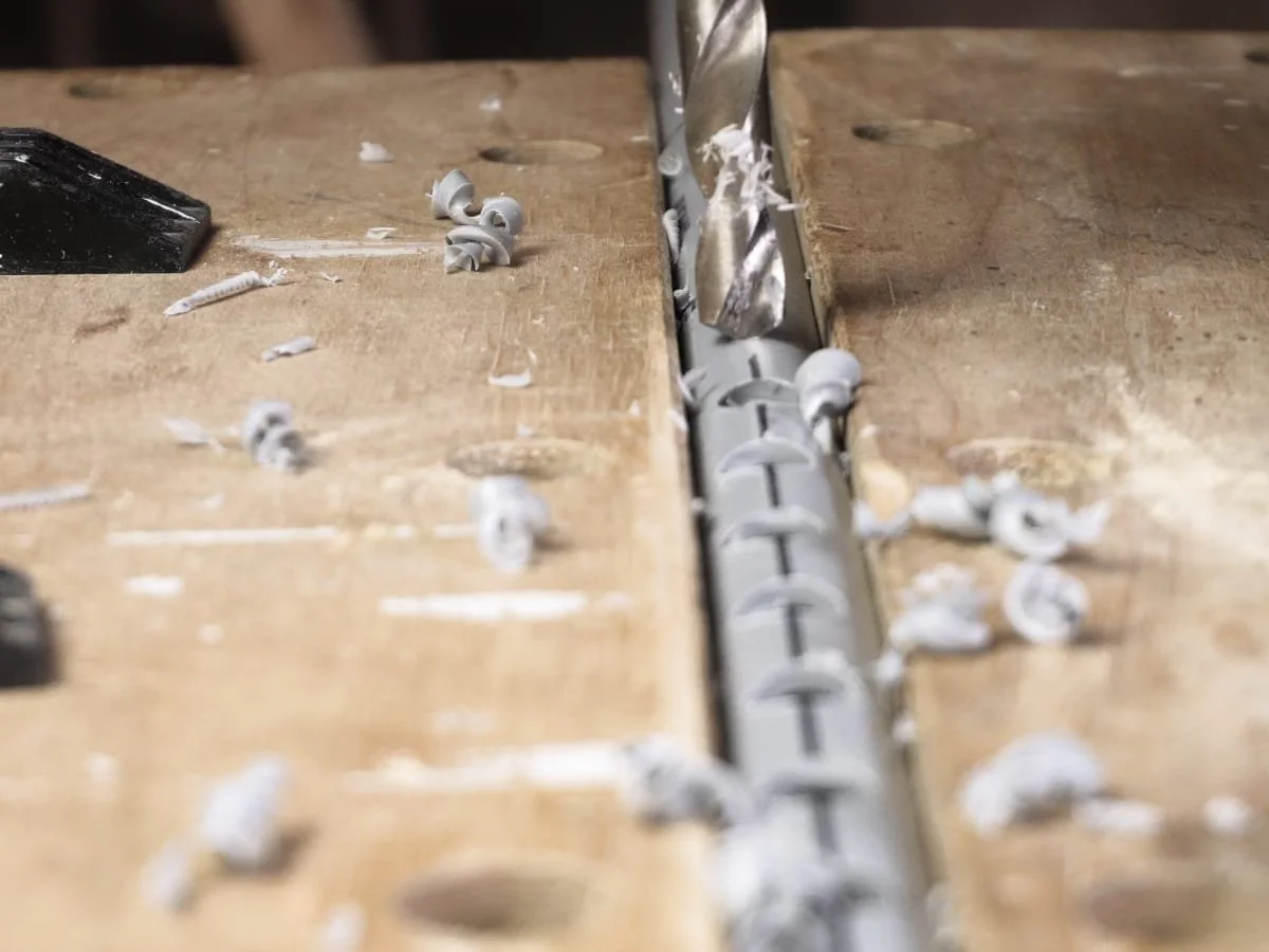 Drilling the holes with a 12mm drill bit