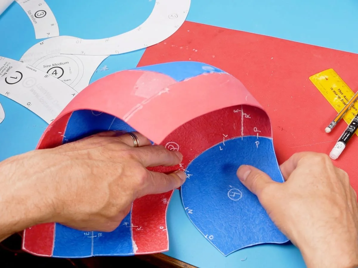 gluing the ear flap to the rest of the aviator helmet