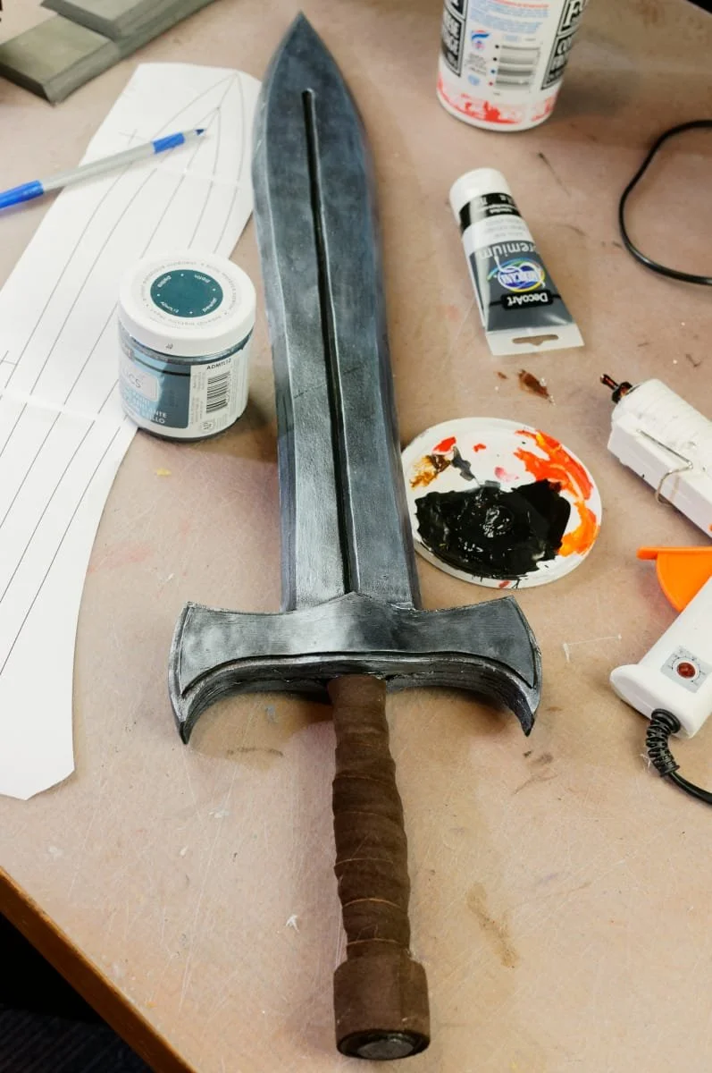 photo of foam sword along with paints and template