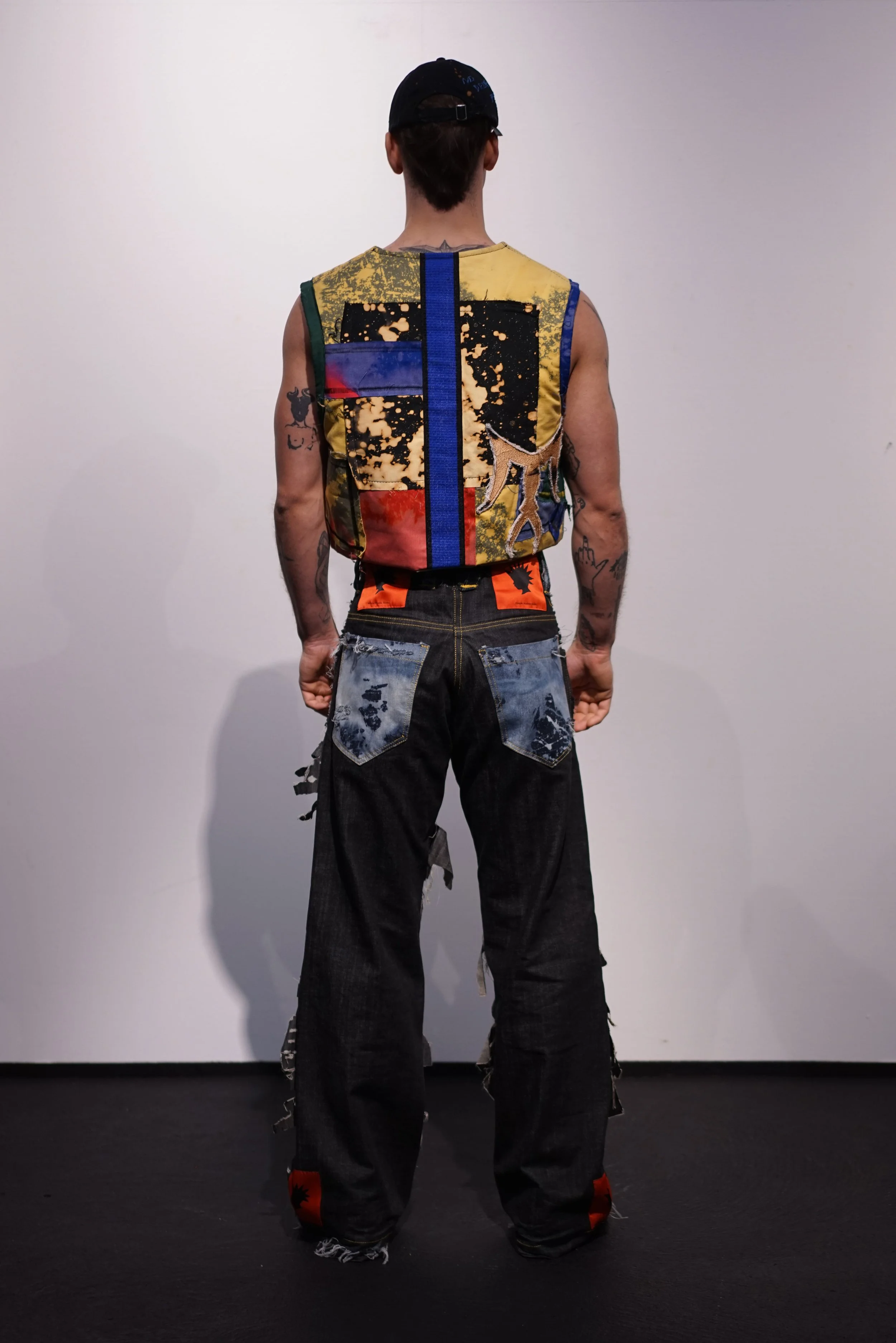 RtN-bleached-batik-collage-vest-raf-simons-rudolf-tanabu-nachbaur-rosen-tragen-naegel-1.jpg