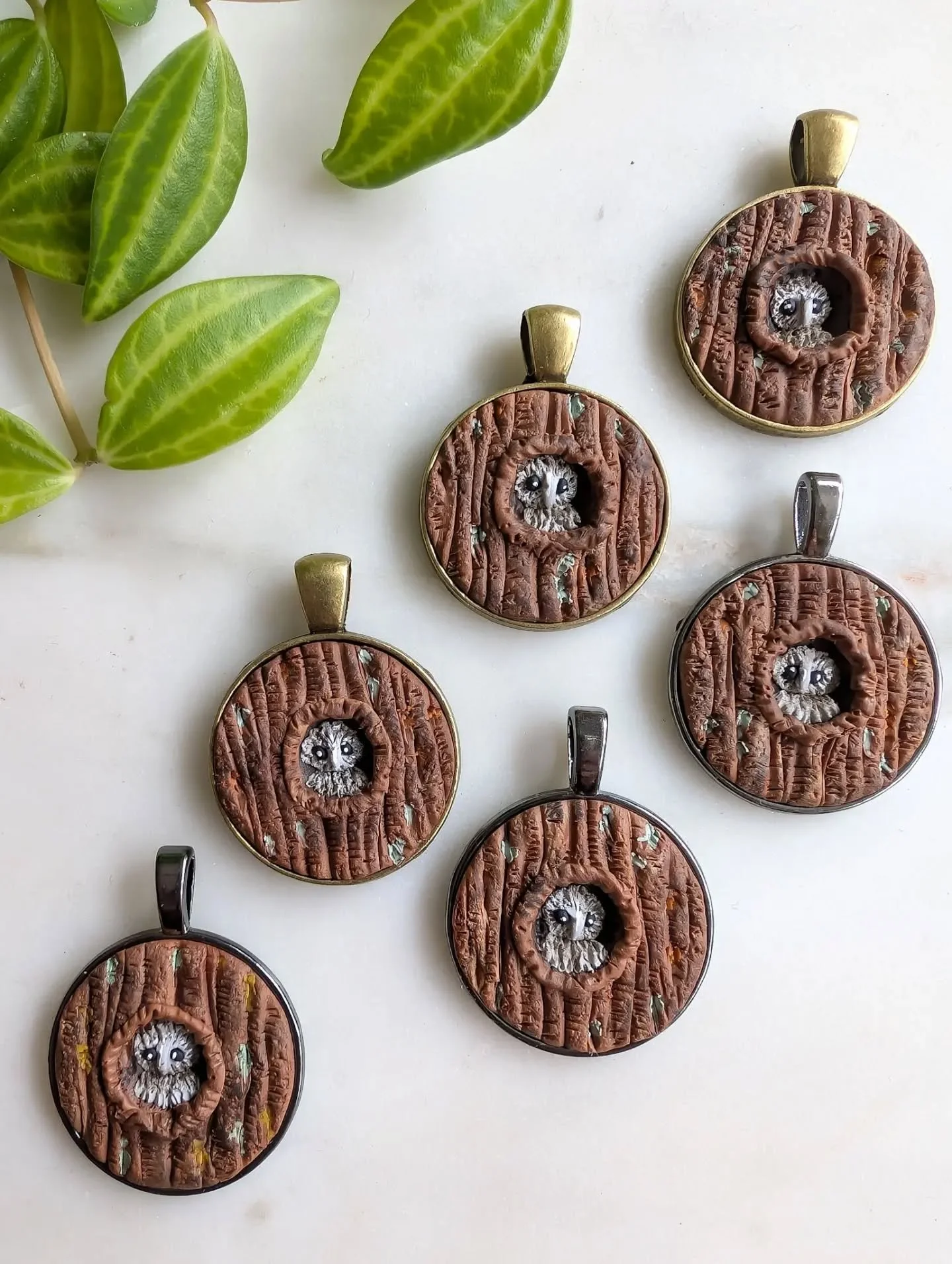 Teeny tiny elf owls are restocked ahead of this year's fall and winter market season!  Available online and at my upcoming markets. 

Which base do you prefer... Antique bronze or gunmetal?

Check out the events page on my website at woodsmokeandwill
