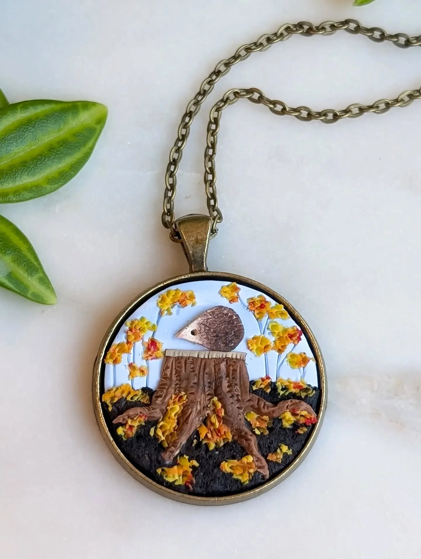 These adorable hedgehog pendants are coming this weekend to Naturecore, and of course, available online at woodsmokeandwillow.com!

I think this cutie is thoroughly enjoying this amazing autumn day, but also contemplating hibernation. Maybe there's a
