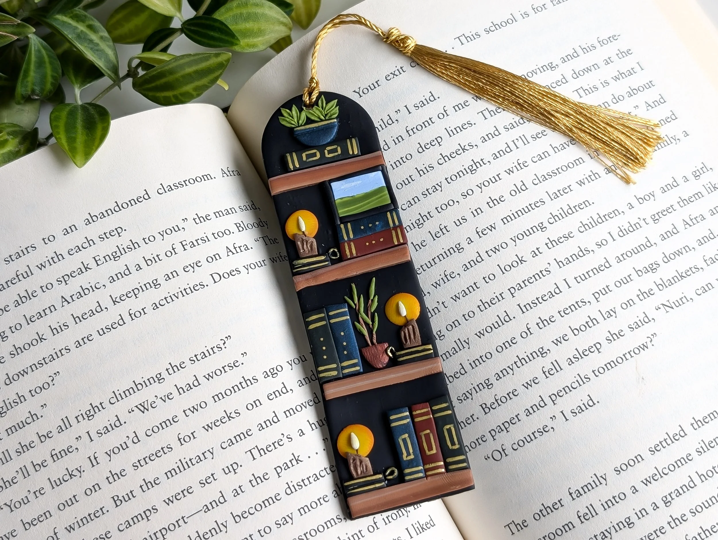 Luxury Hand Sculpted Polymer Clay Bookmark featuring a modern bookcase with plants, candles, books and art