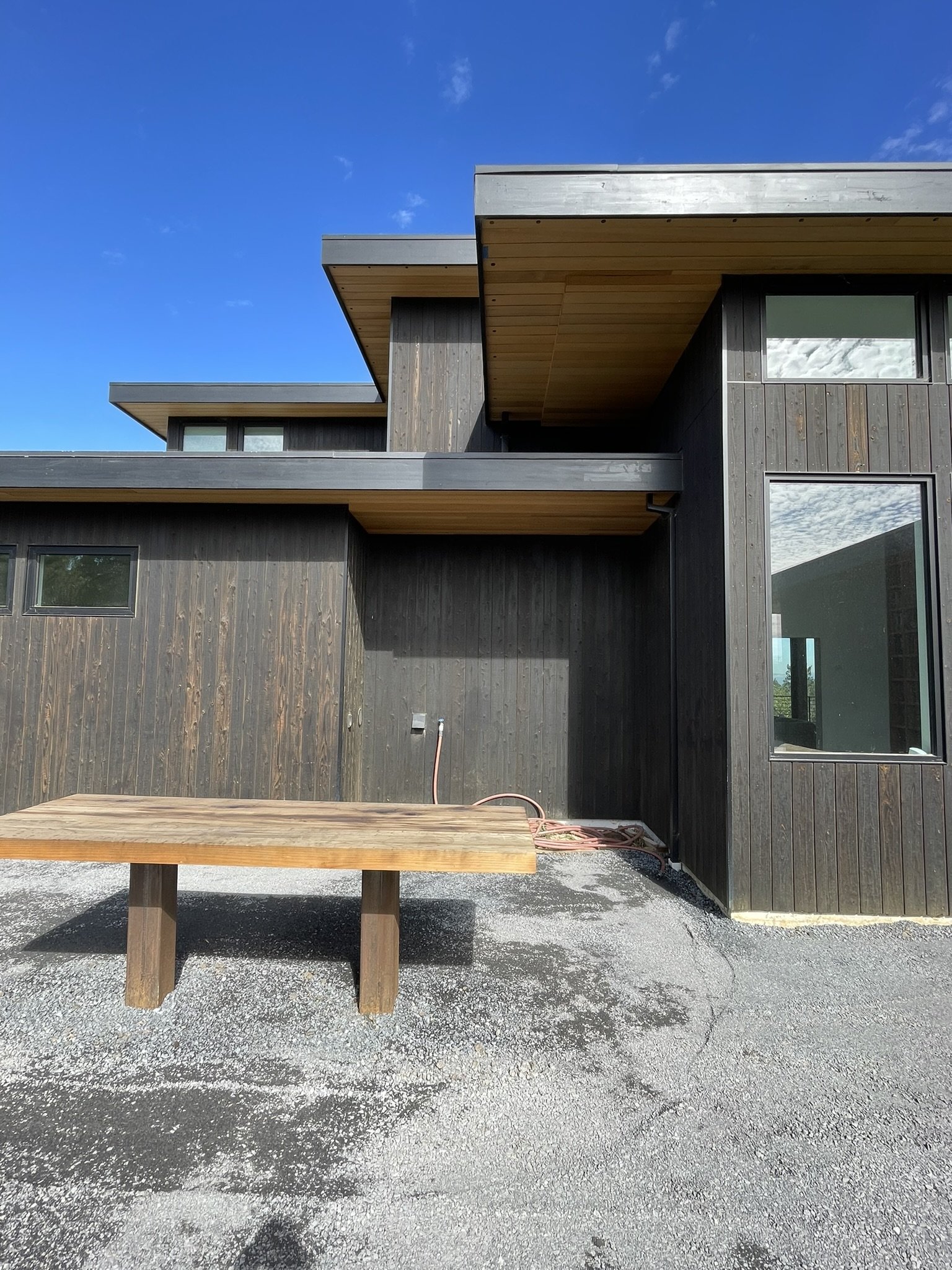 In progress photo of the outdoor dining table before the pergola was installed