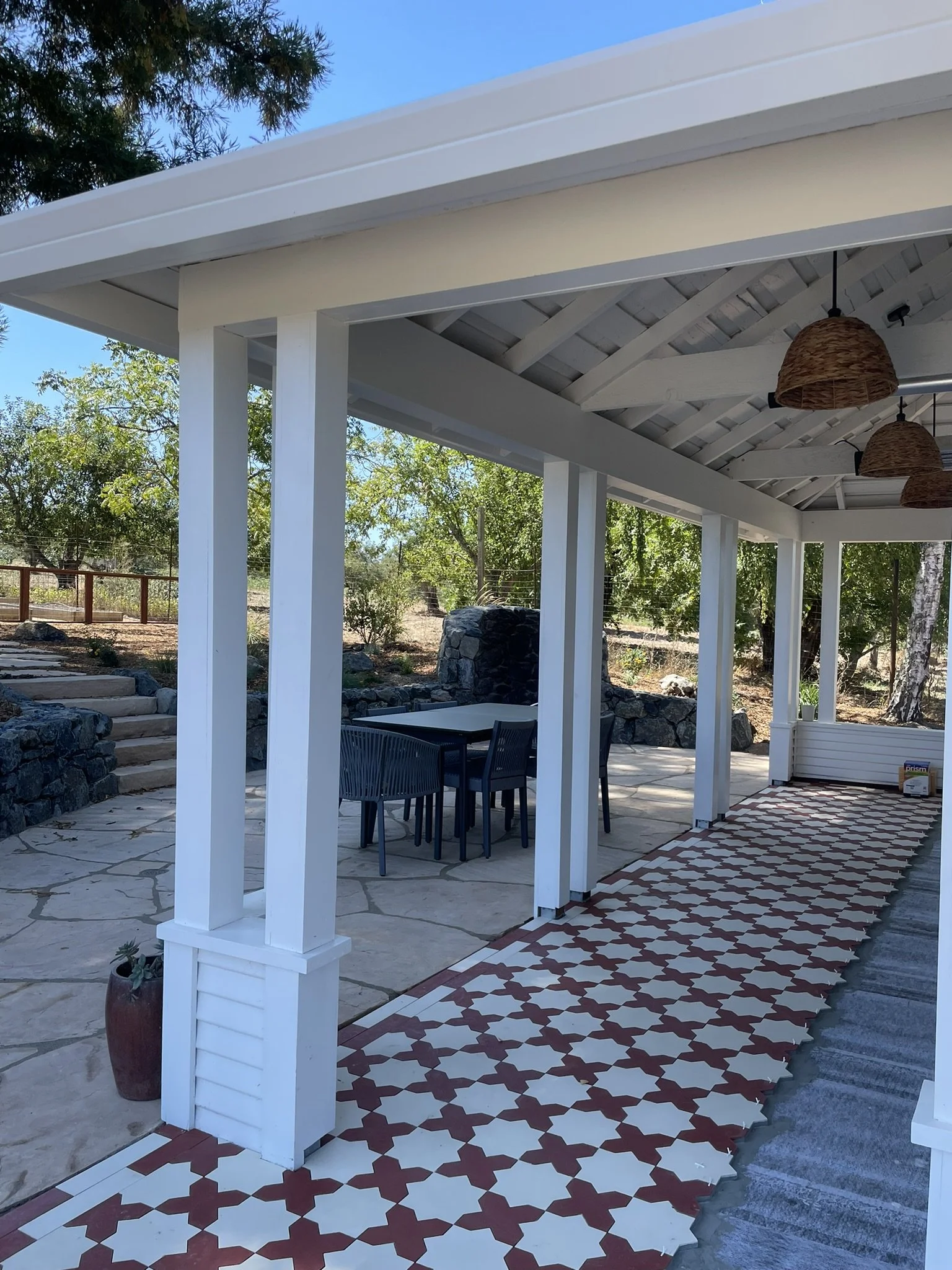 In progress photo of the covered patio during tile work. Tile not installed by WEA.